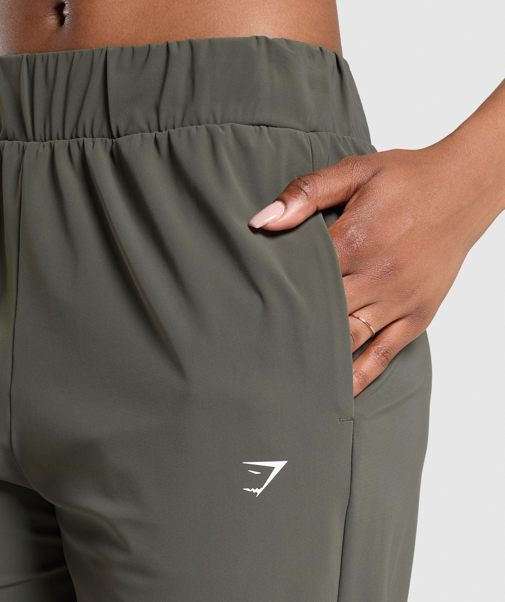 Gymshark Tapered Woven Pants - Strength Green Female Product Image