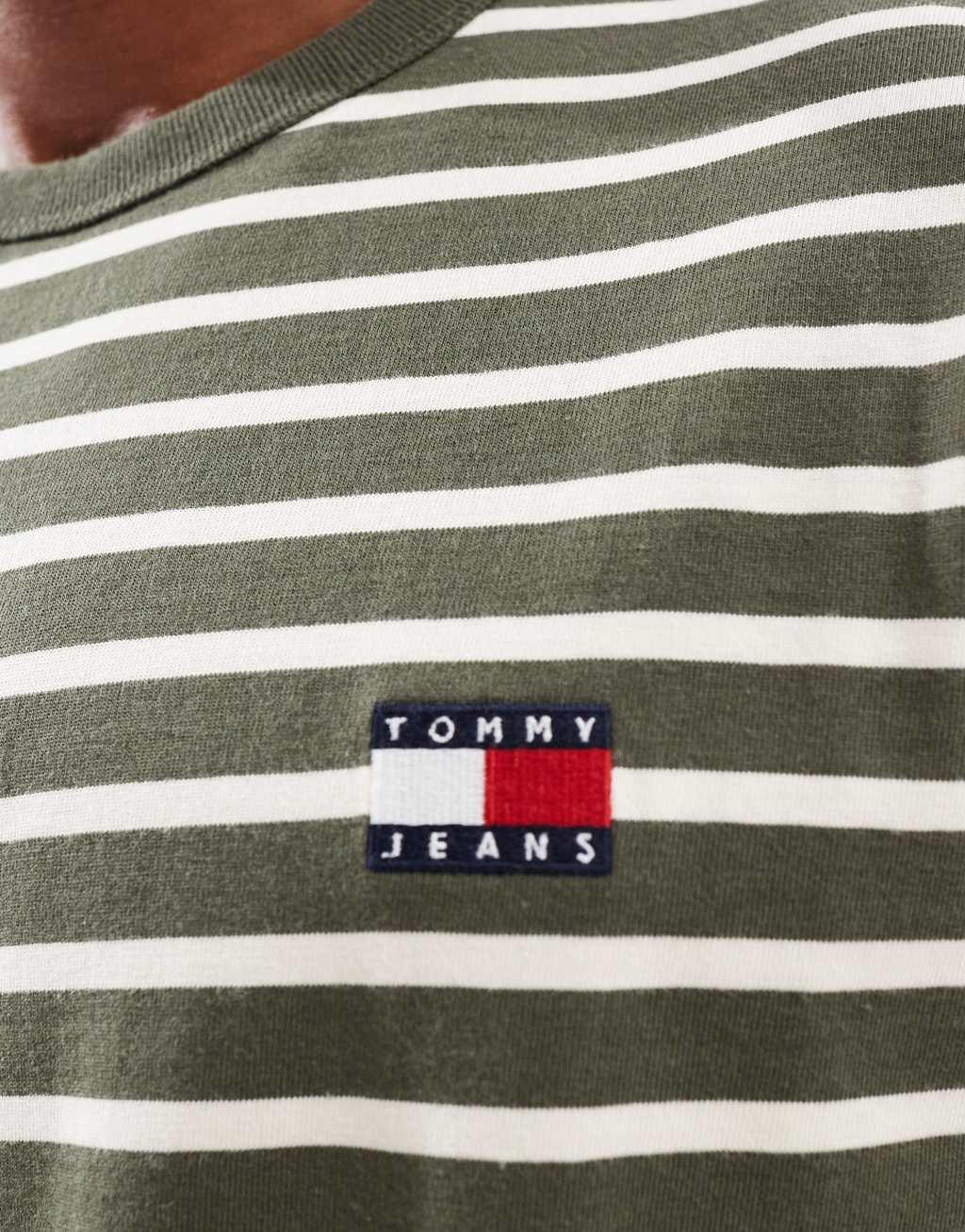 Tommy Jeans badge t-shirt in olive and cream stripe Product Image