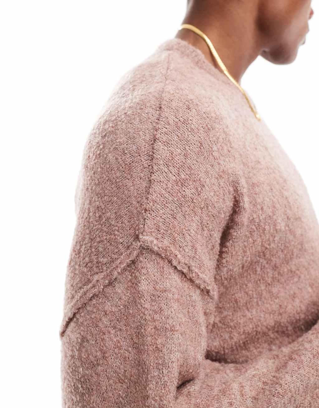 ASOS DESIGN relaxed lightweight boucle texture knitted crew neck sweater in pink Product Image