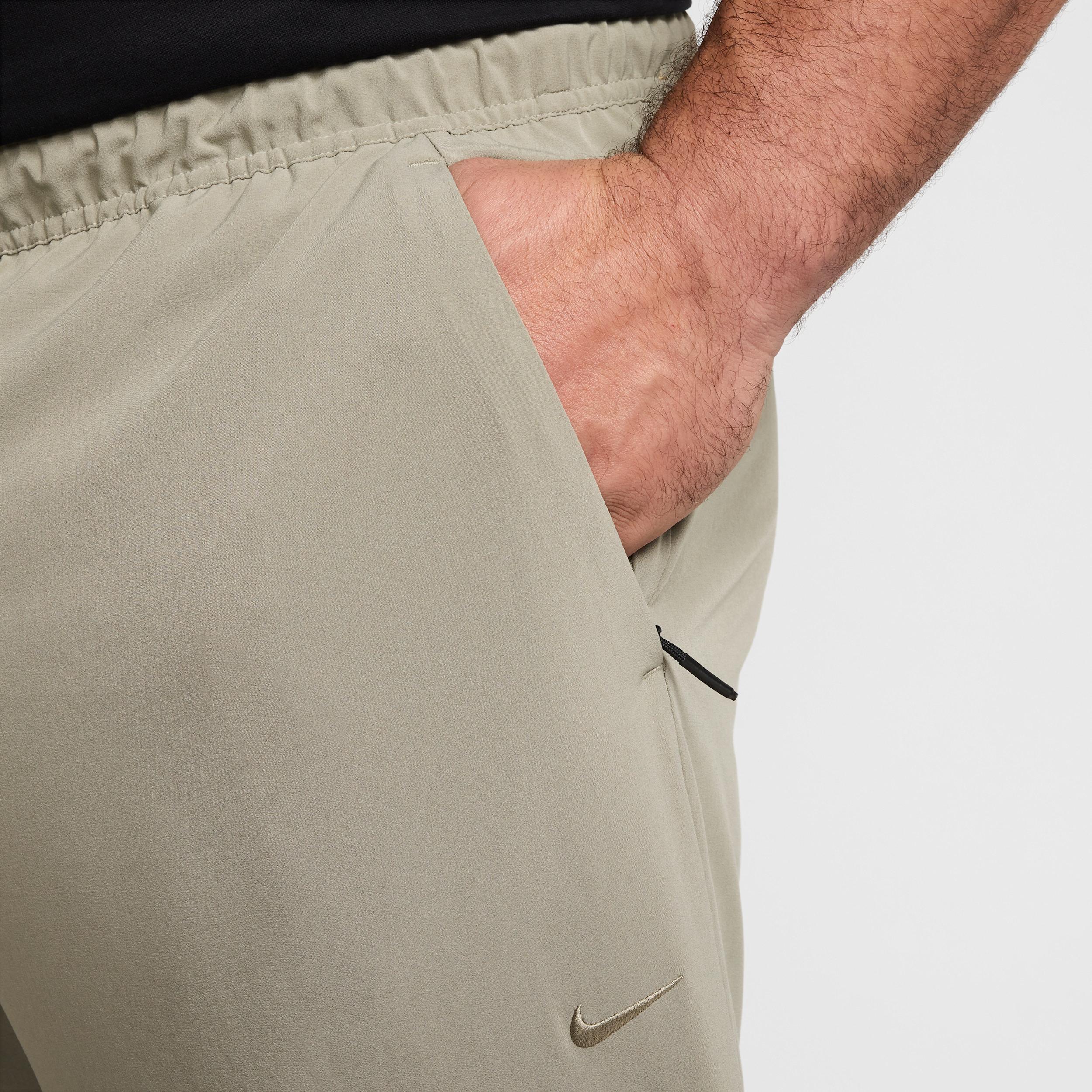 Nike Unlimited Men's Dri-FIT Zippered Cuff Versatile Pants Product Image