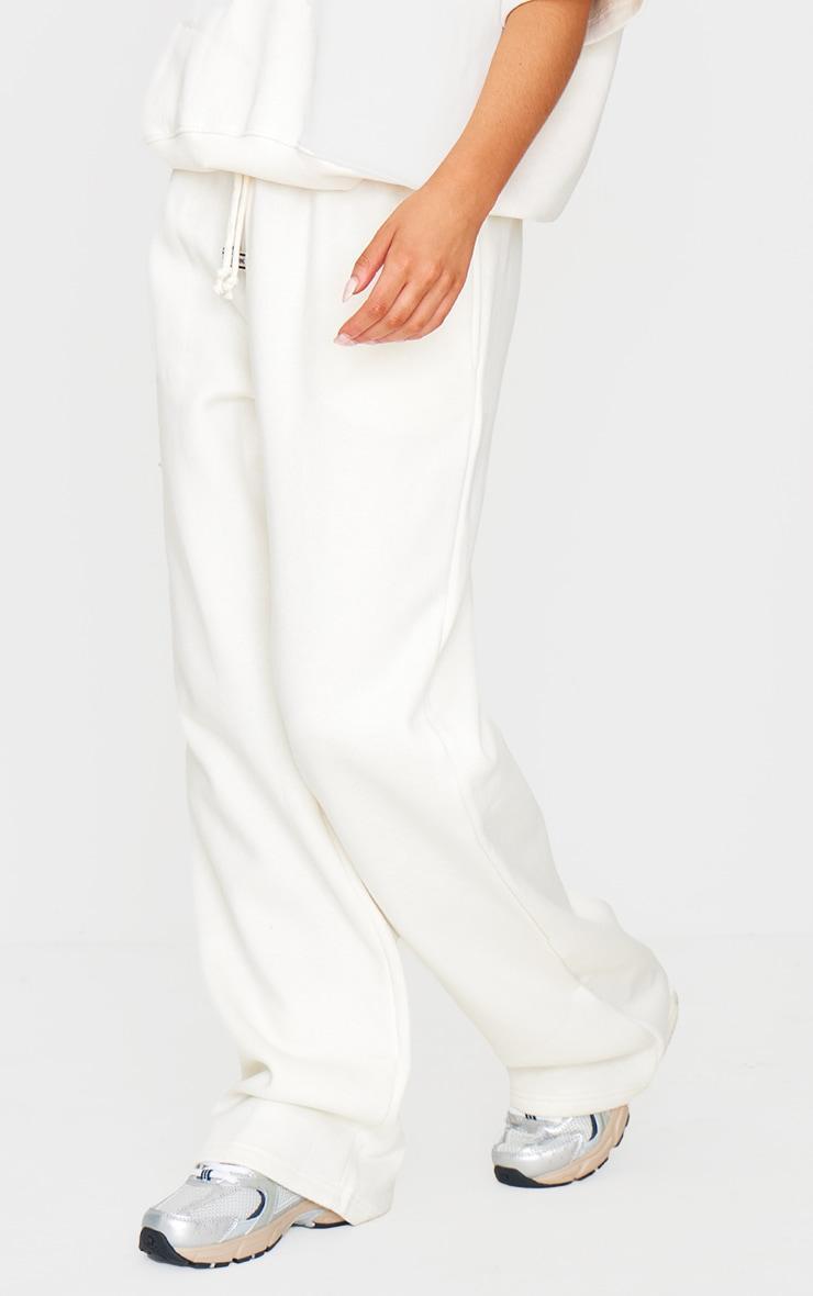 PRETTYLITTLETHING Cream Badge Detail Mid Rise Wide Leg Sweatpants Product Image