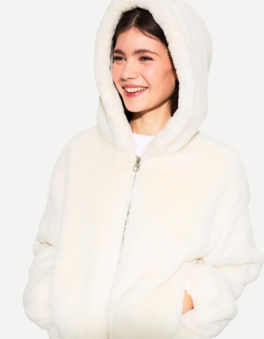 Quilted jacket with faux fur hood Product Image