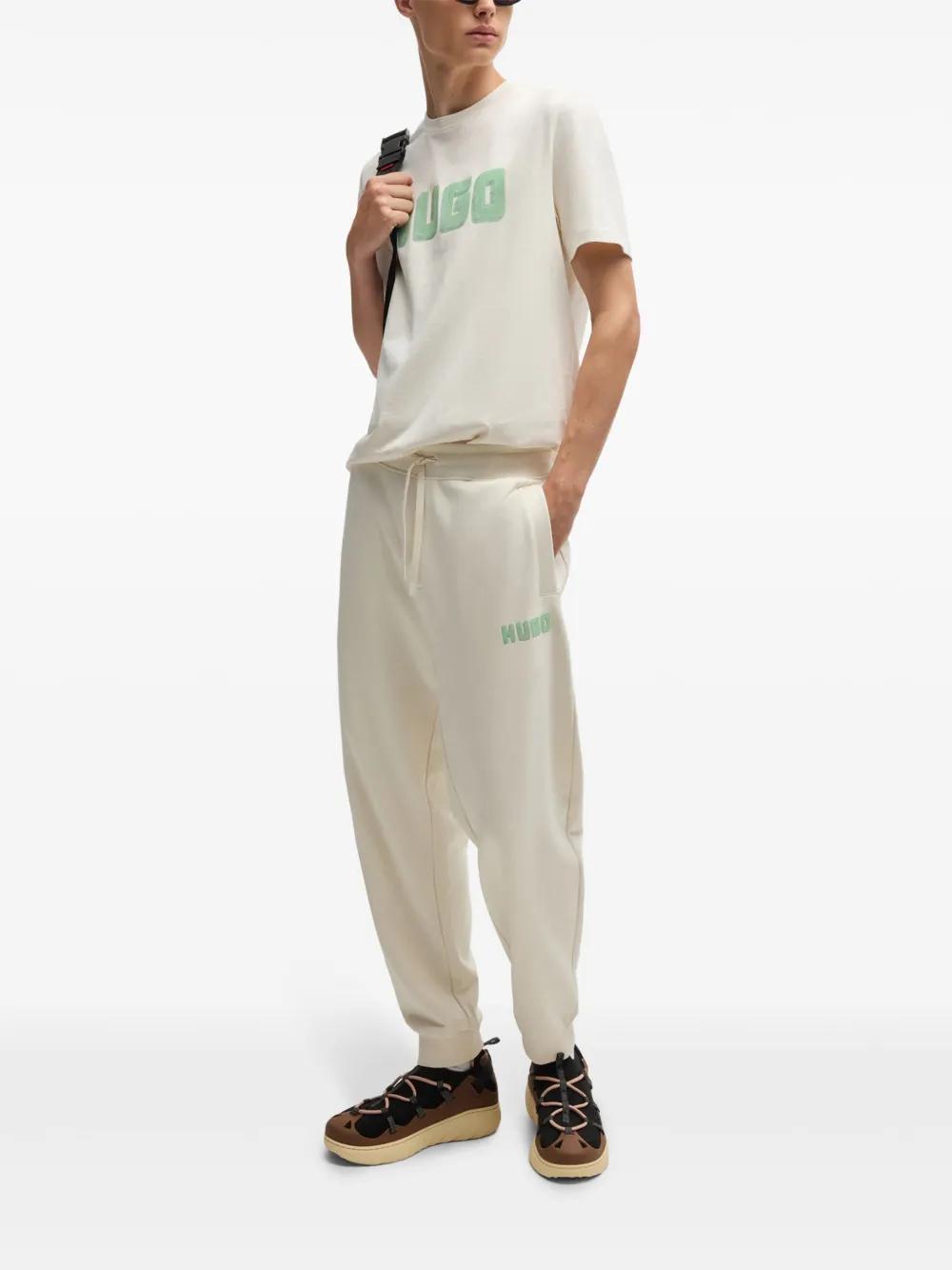 HUGO BOSS Cotton-terry Tracksuit Bottoms With Logo Print In White Product Image