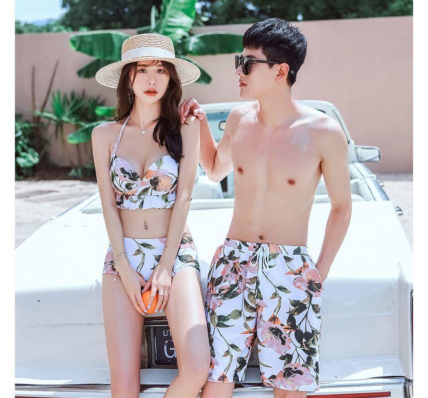 Couple Matching Floral Swim Trunks / Halter Ruffle Hem Tankini Top / Tankini Bottom / Flared-Sleeve Swim Dress / Set Product Image