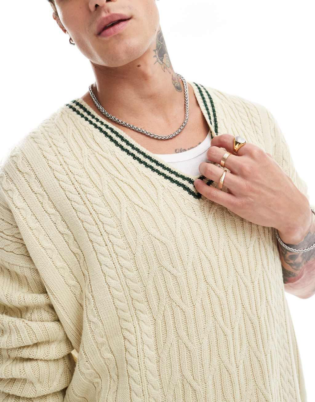 ASOS DESIGN oversized cable knit cricket sweater in cream with green tipping Product Image