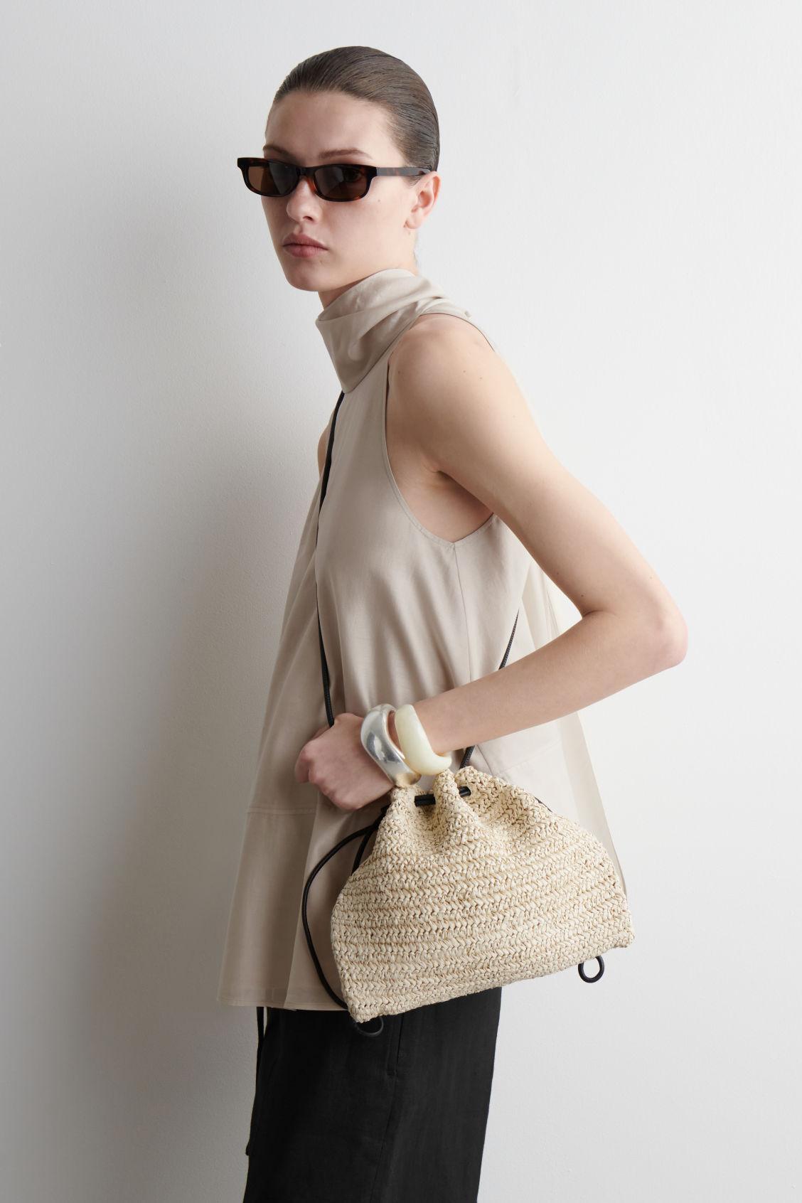 MINI CAVATELLI CLUTCH BAG - STRAW Product Image