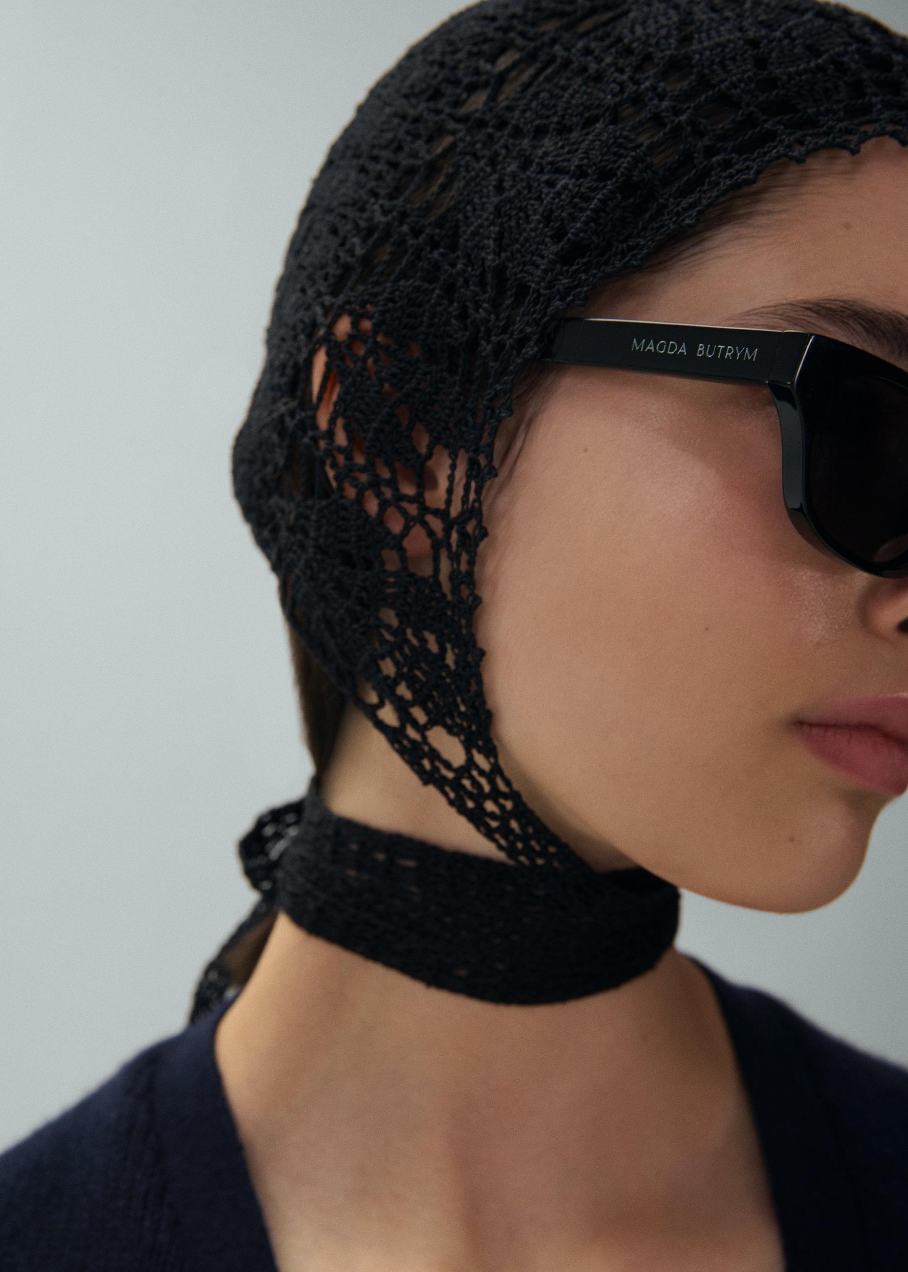 Crochet bonnet in black Product Image