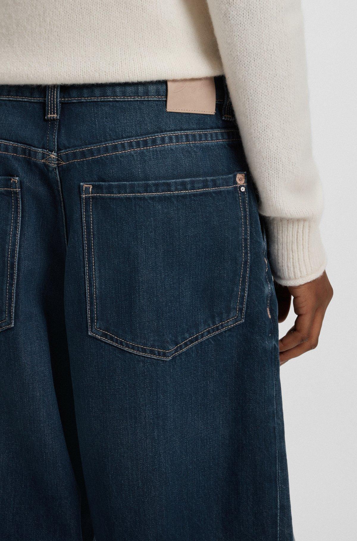 Wide-leg jeans with front pleats Product Image