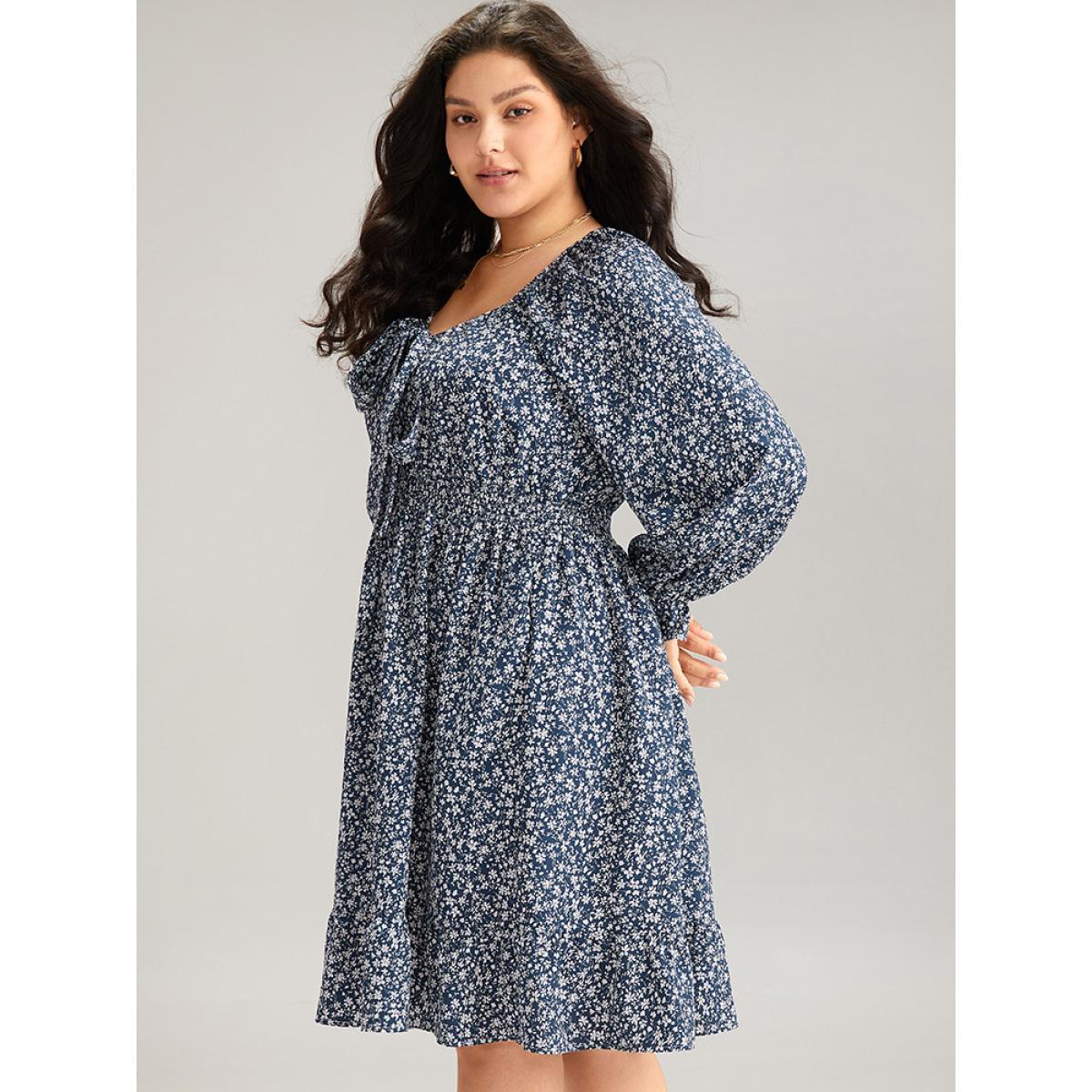 Plus Size Ditsy Floral Flutter Trim Shirred Knot Neck Dress Stone Women Elegant Cross straps Tie Neck Long Sleeve Curvy Knee Dress BloomChic 28/5X Product Image