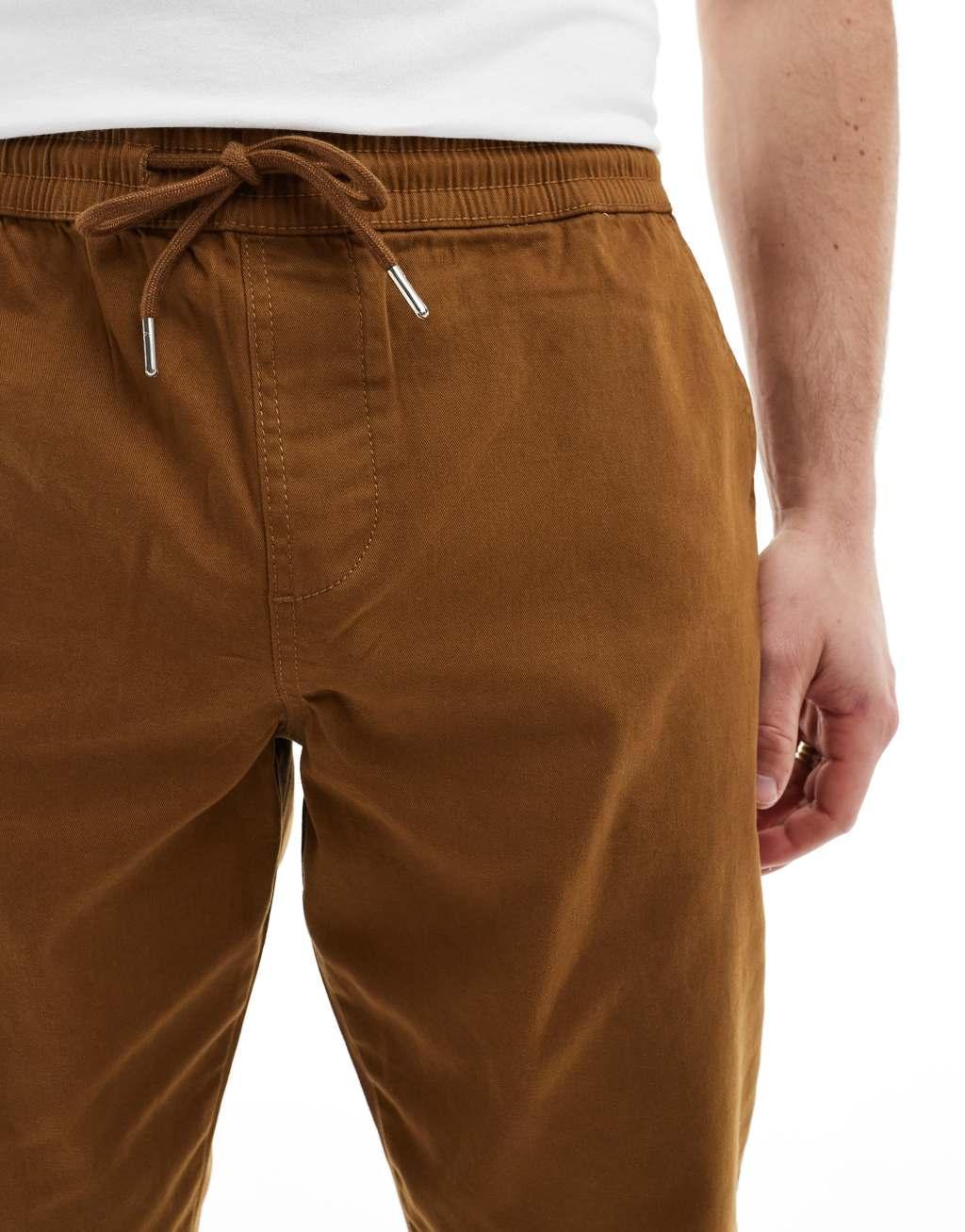 ASOS DESIGN slim pull on pants in brown Product Image