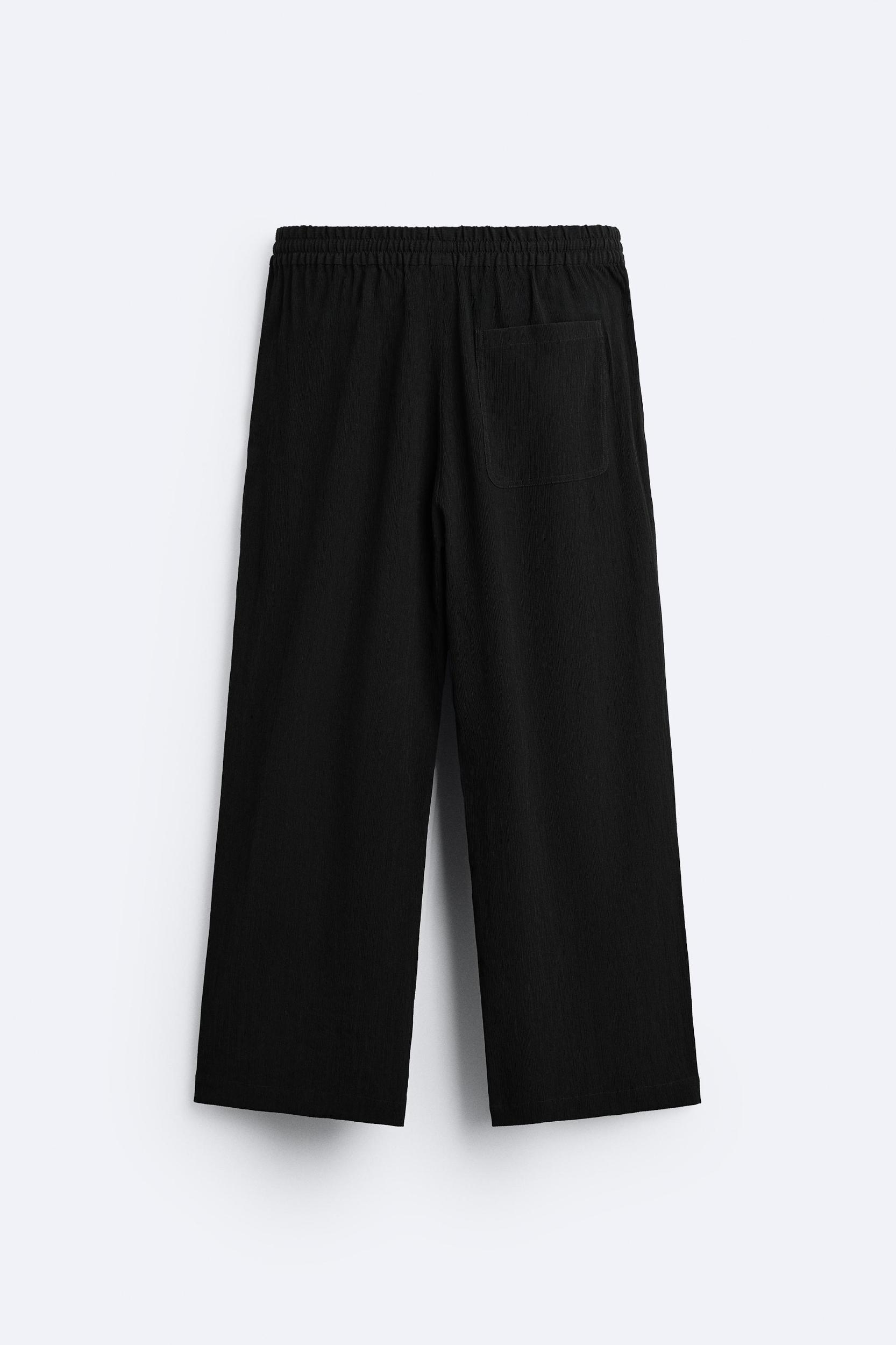 PLEATED PANTS Product Image