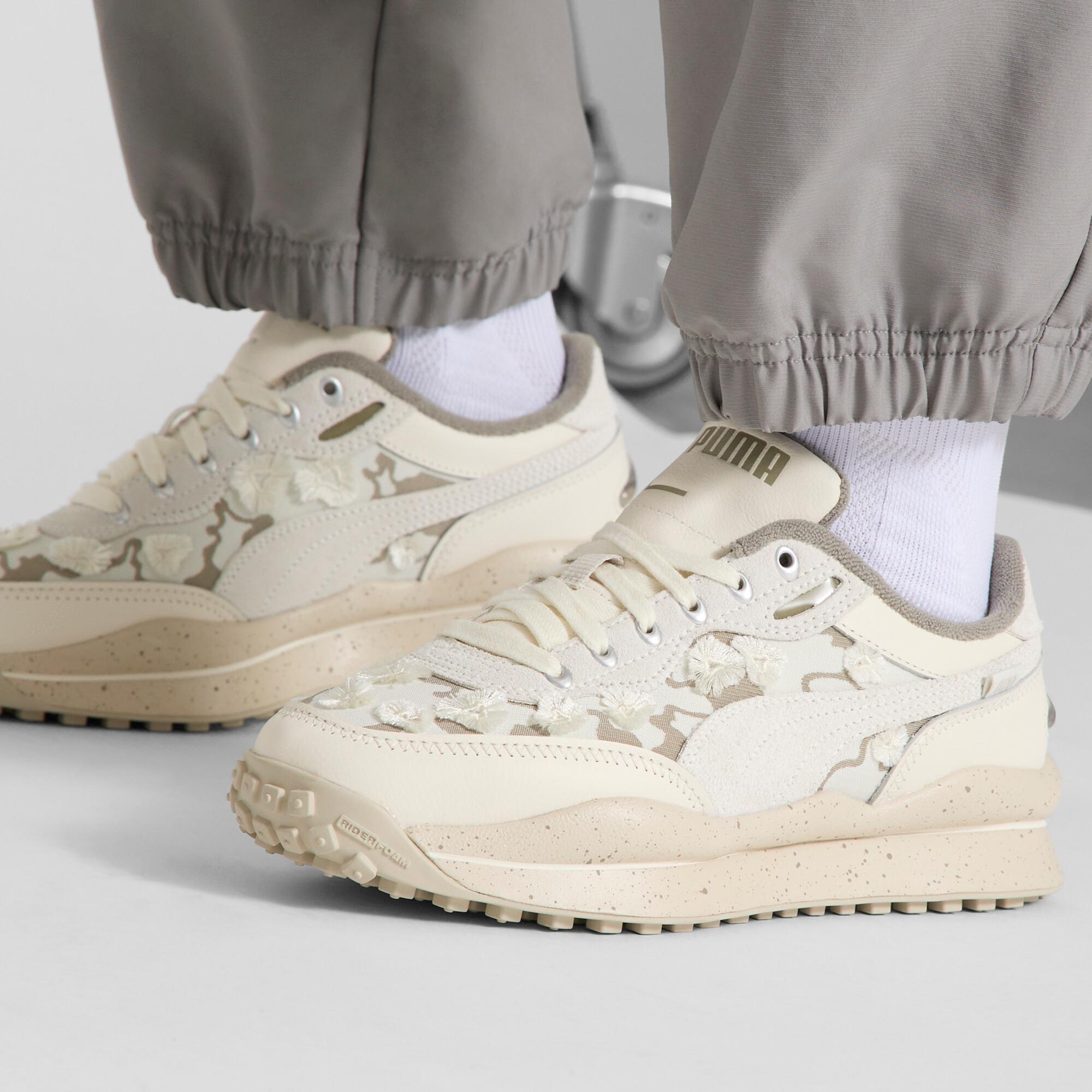 Style Rider Trim Women's Sneakers Product Image