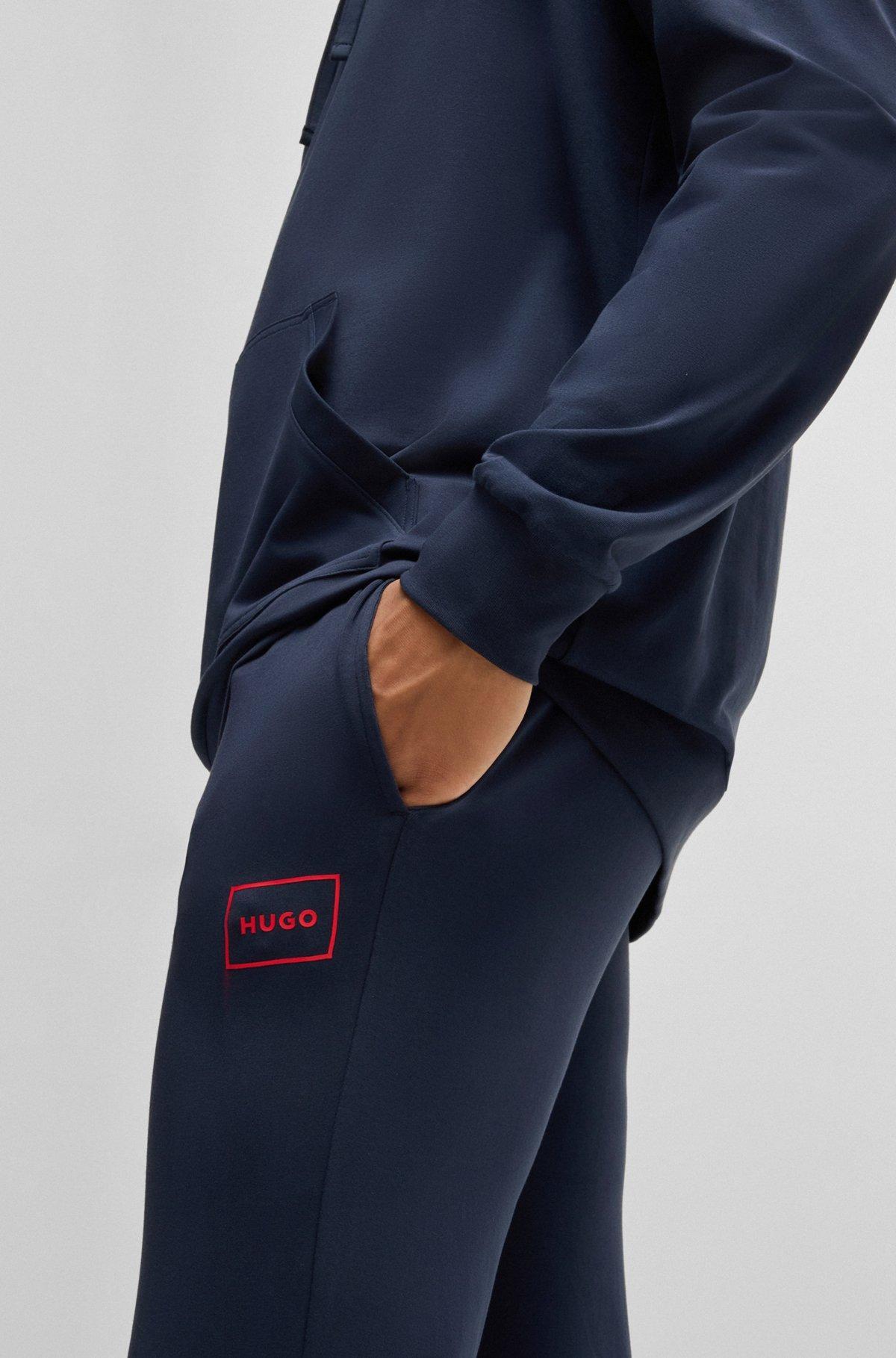 Stretch-cotton tracksuit bottoms with logo print Product Image