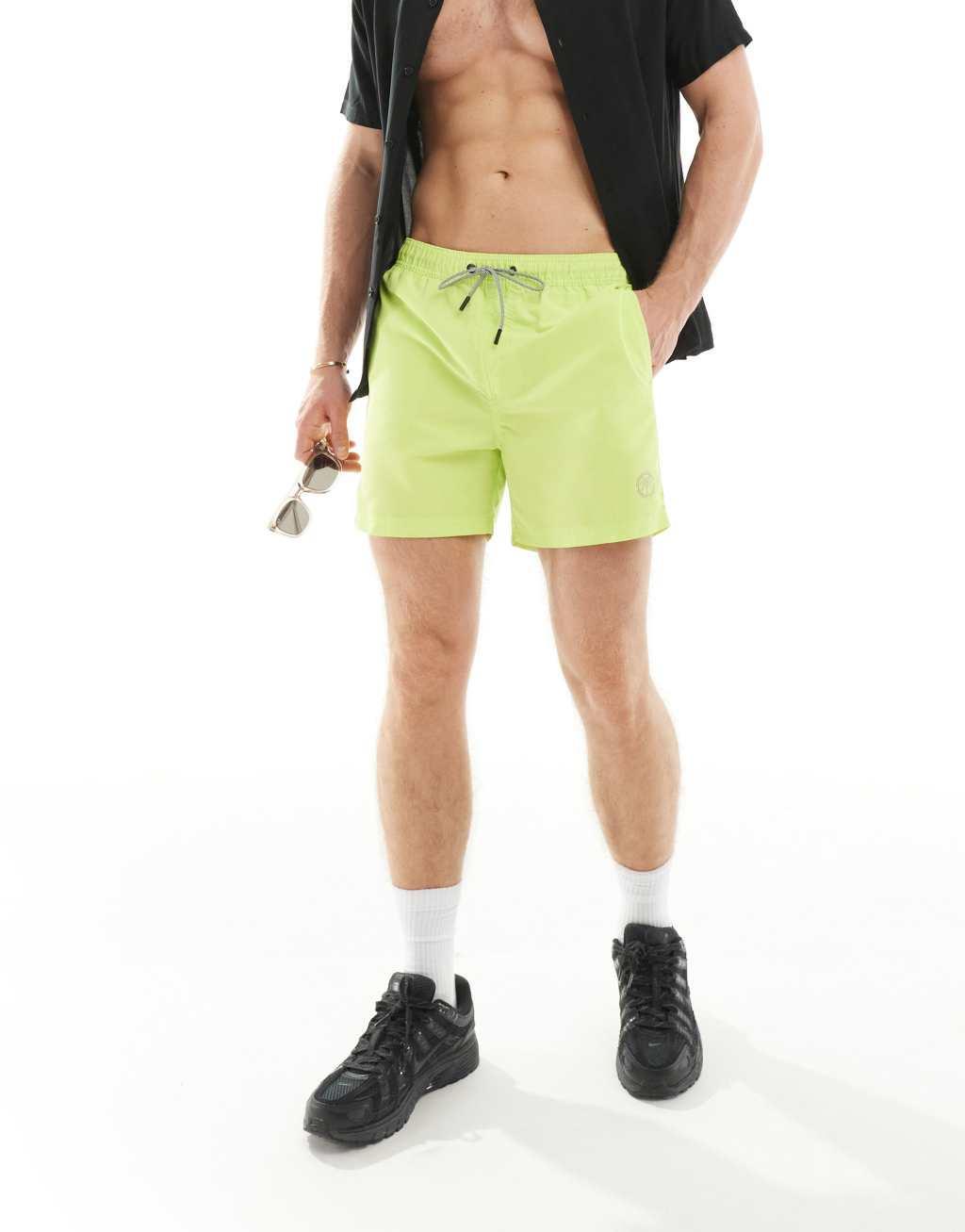 Jack & Jones swim shorts in lime green Product Image