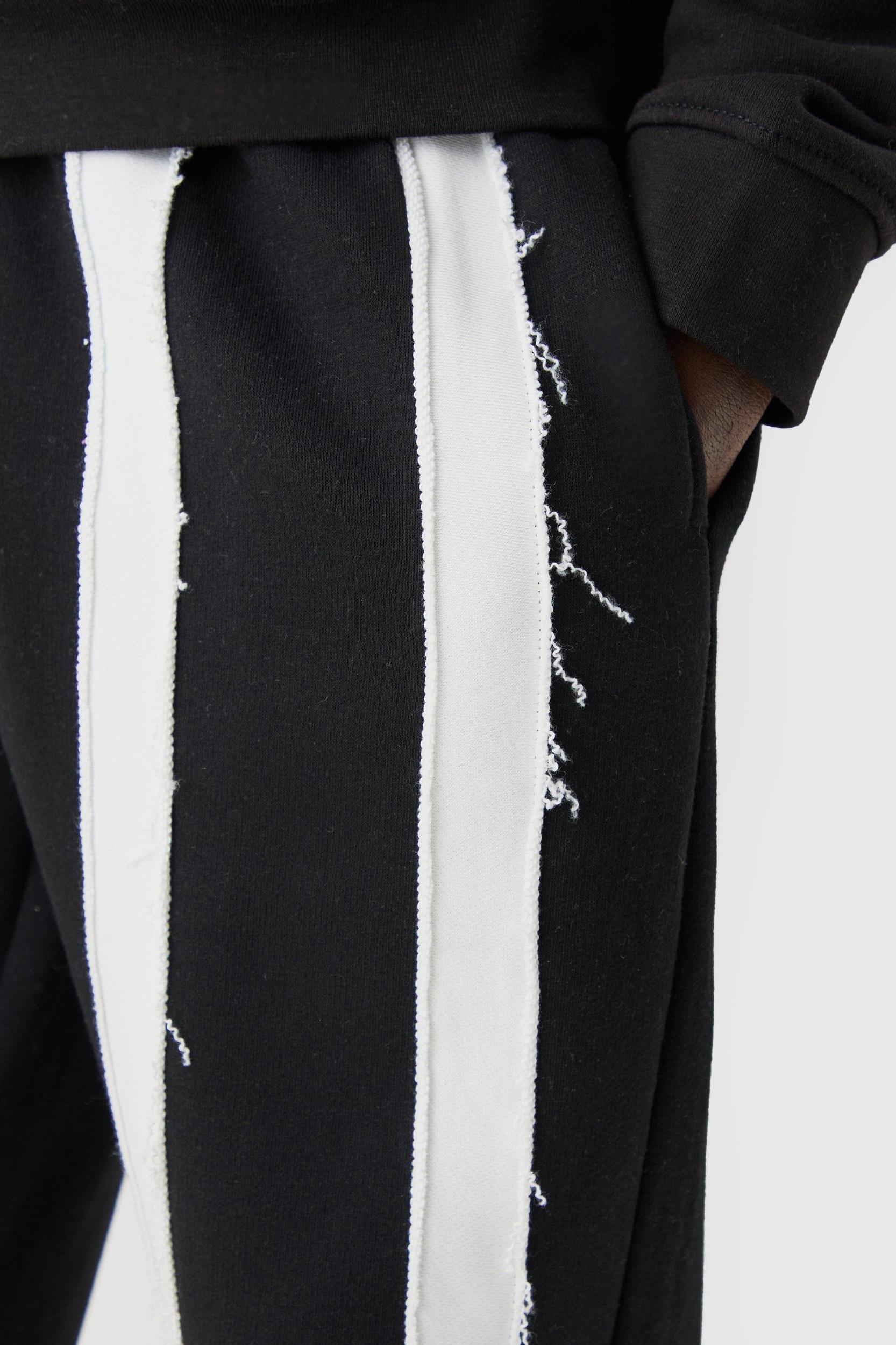 Relaxed Cut & Sew Stripe Raw Edge Sweatpants | boohooMAN USA Product Image