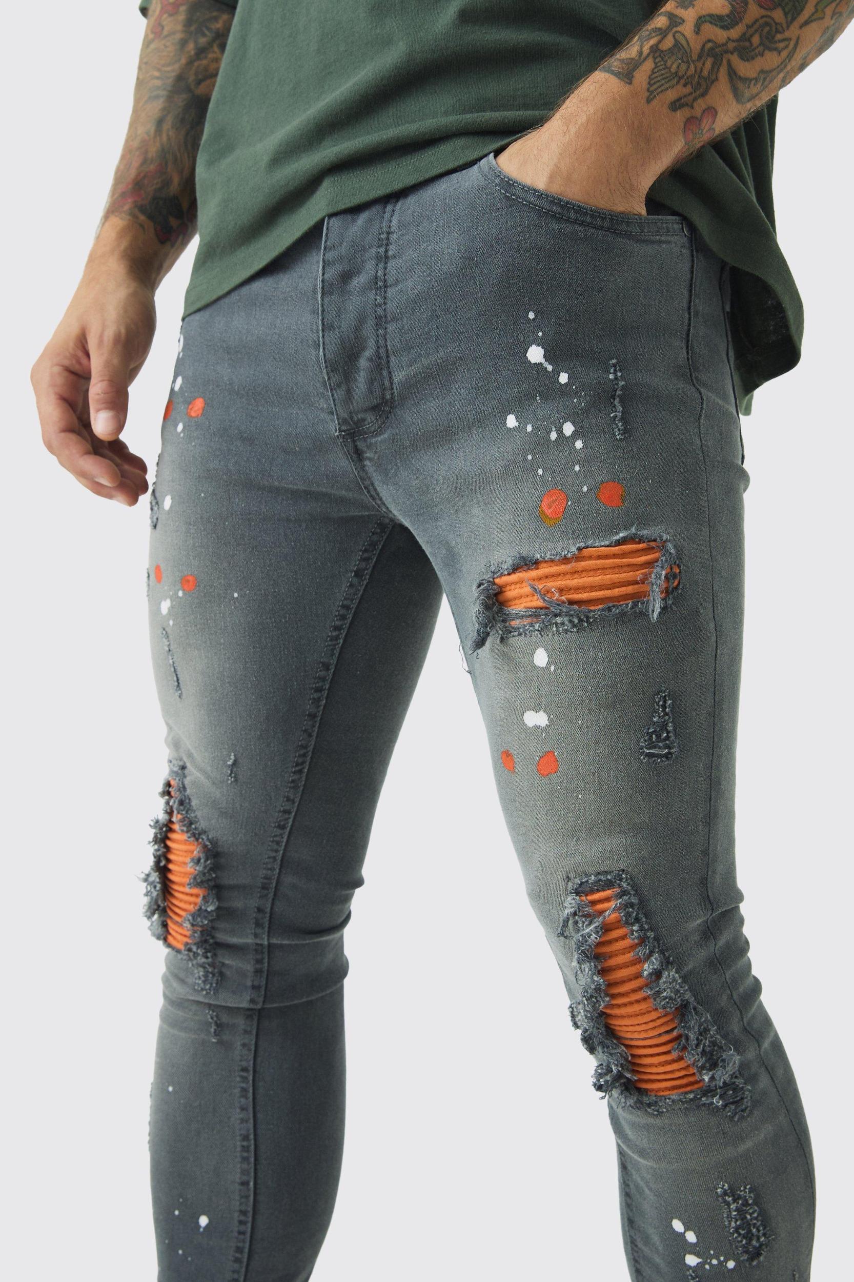Super Skinny Stretch Biker Rip & Repair Paint Splat Jeans | boohooMAN USA Product Image