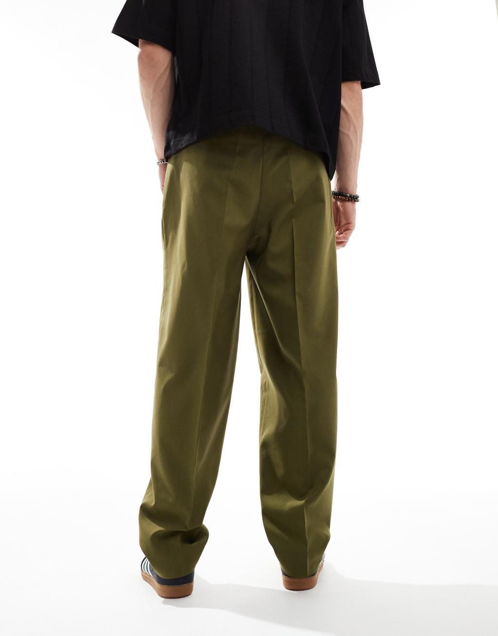 ASOS DESIGN smart oversized tapered pants in green with half elastic waist Product Image
