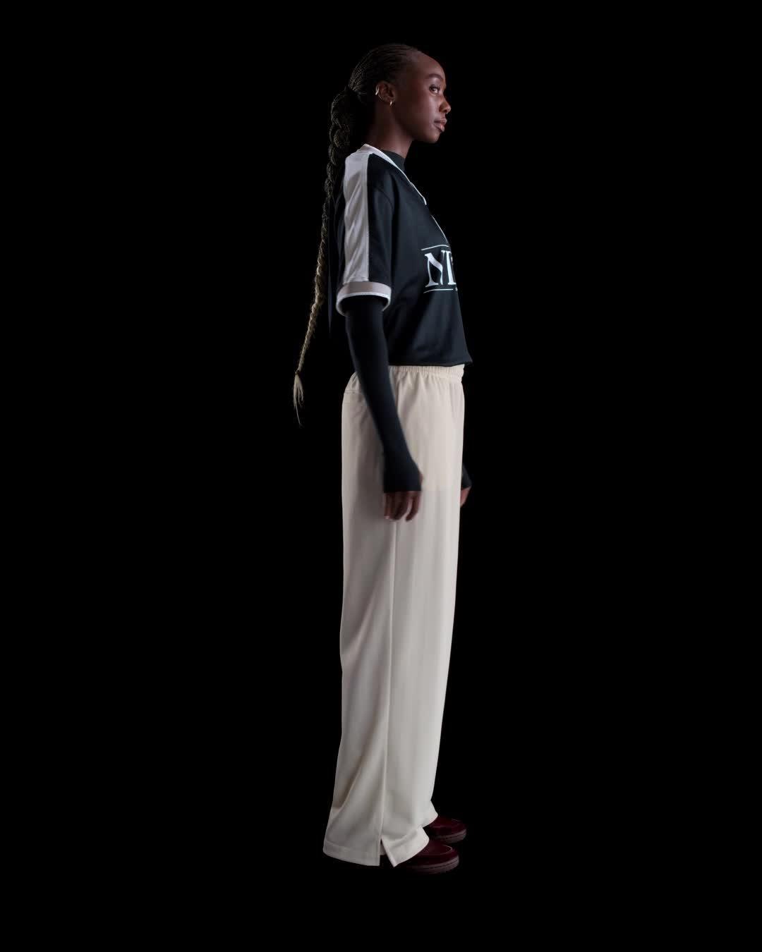 Nike Sportswear Women's Mid-Rise Loose Jacquard Striped Track Pants Product Image
