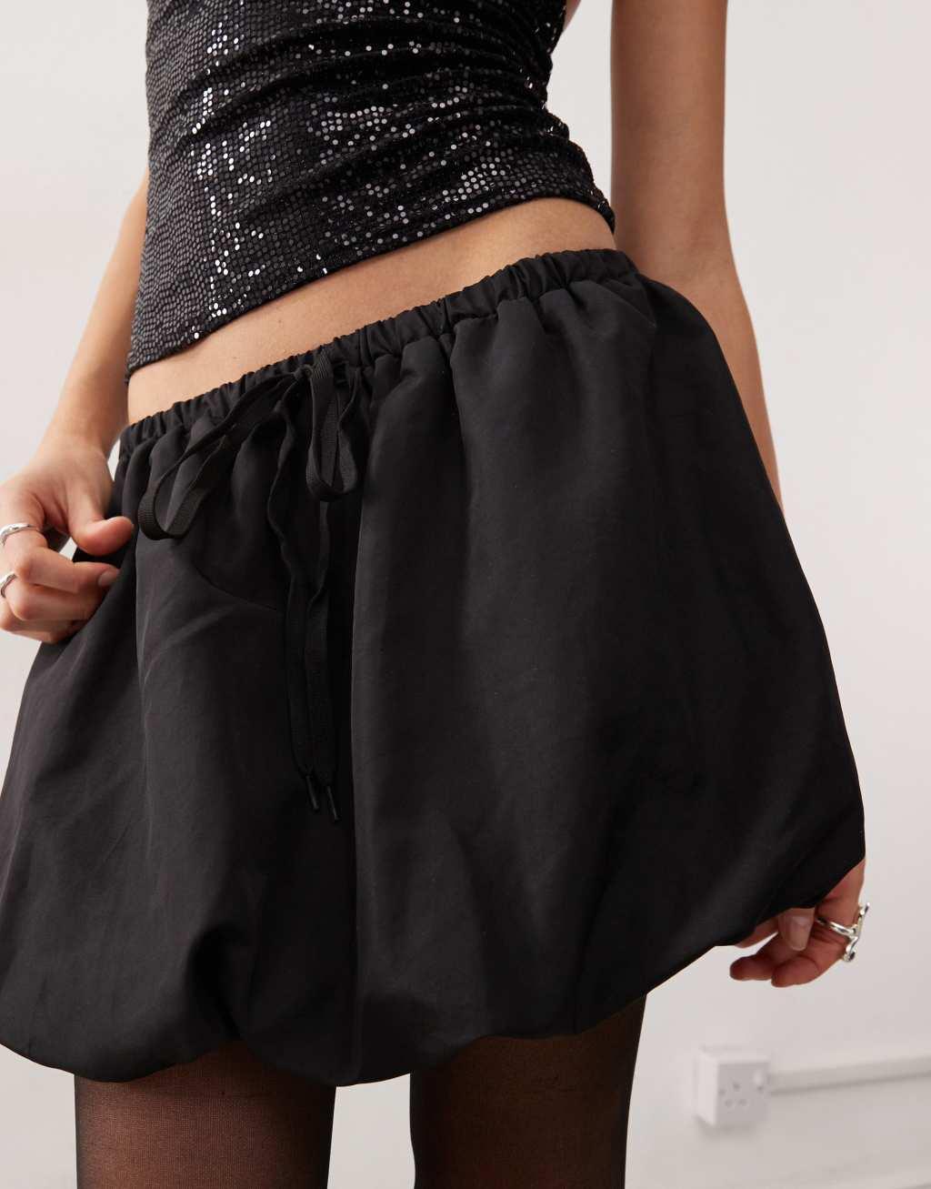 Monki puffball mini skirt in black Product Image