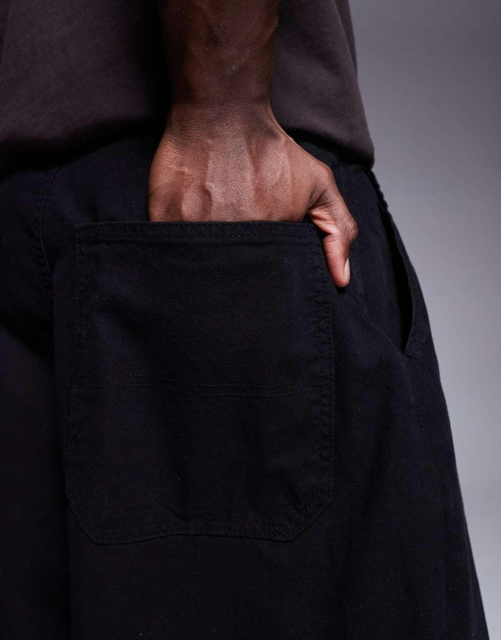 ASOS DESIGN super baggy chino pants in black Product Image