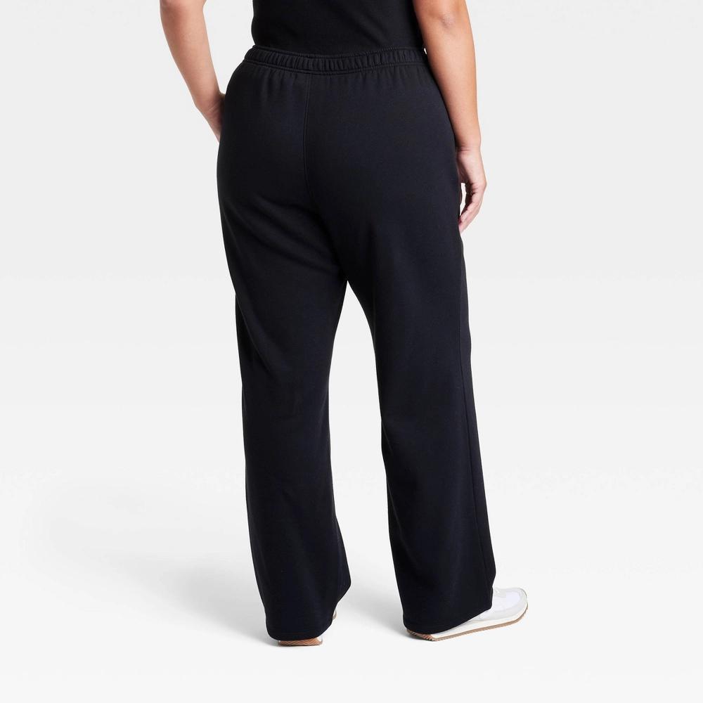 Women's Leisure Studio Mid-Rise Knit Straight Leg Sweatpants - Universal Thread™ Black 1X: Cotton Blend, Elastic Waist, Side Pockets Product Image