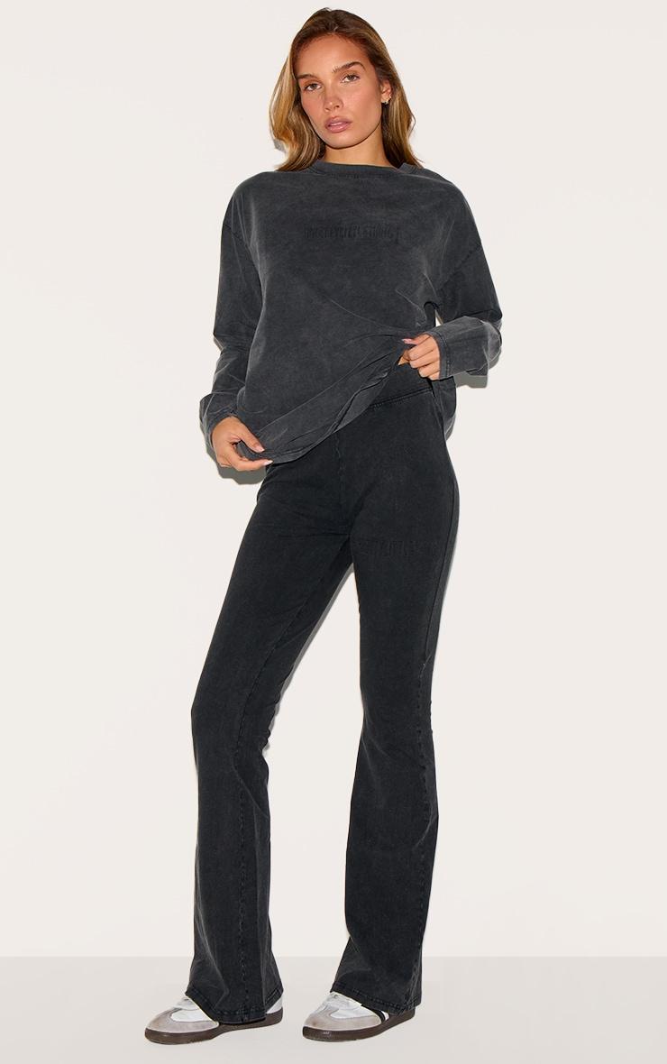 PRETTYLITTLETHING Black Embossed Logo Washed Long Sleeve T-shirt Product Image