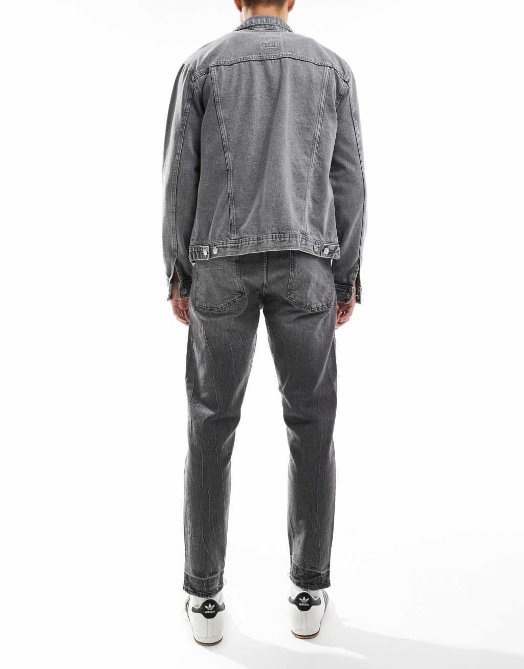 ASOS DESIGN tapered fit jeans with stretch in washed gray Product Image