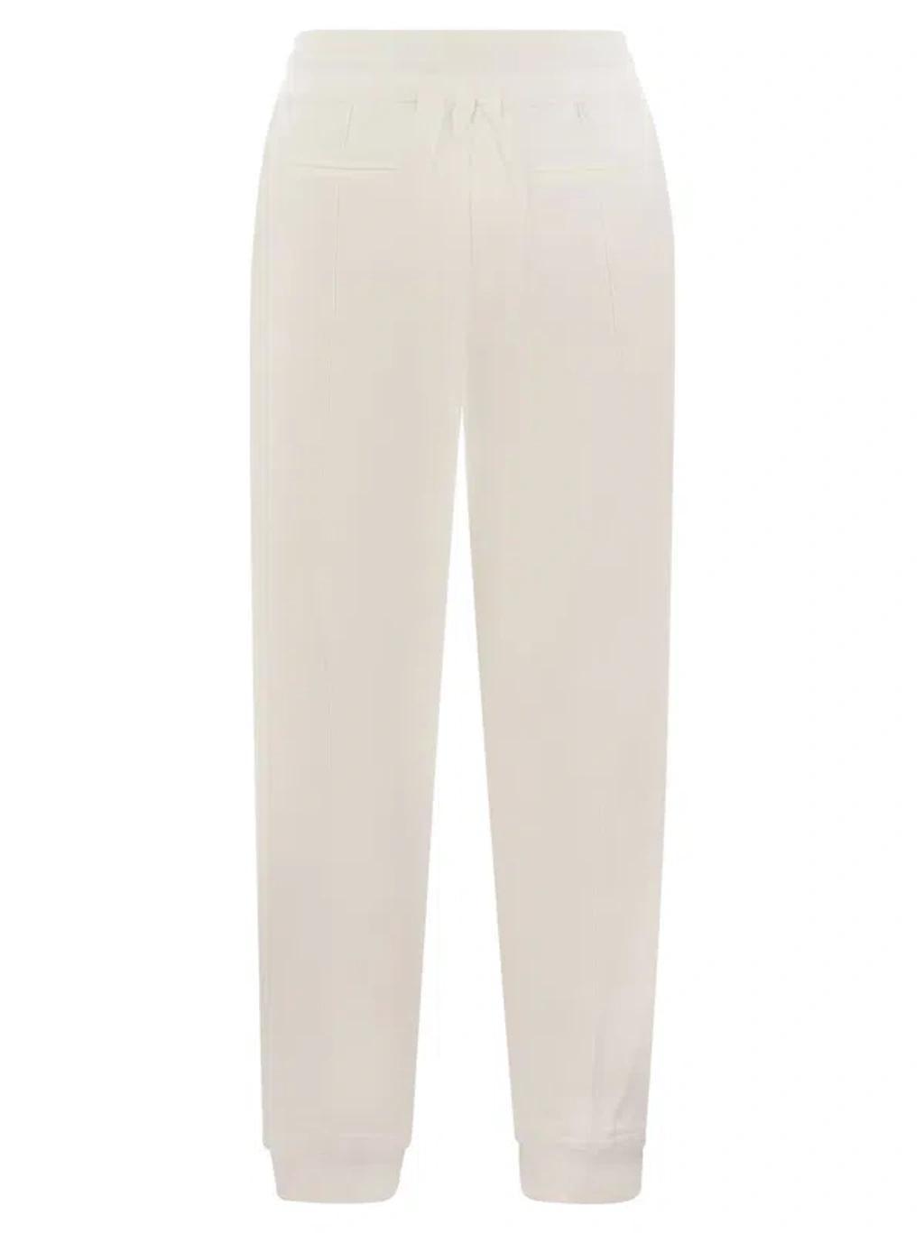 BRUNELLO CUCINELLI Elegant Cotton Fleece Pants With Crease Detail And Elastic Hem In White Product Image
