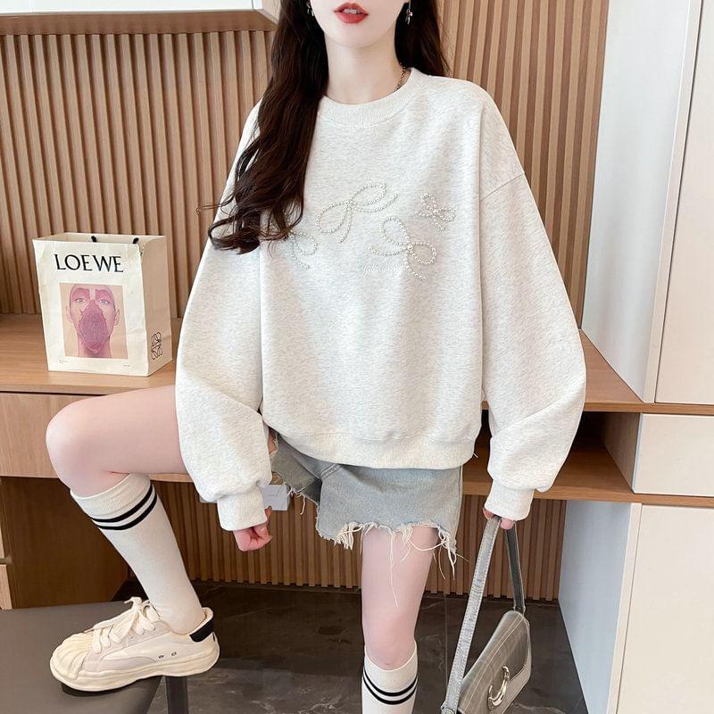 Crew Neck Faux Pearl Bow Pullover Product Image