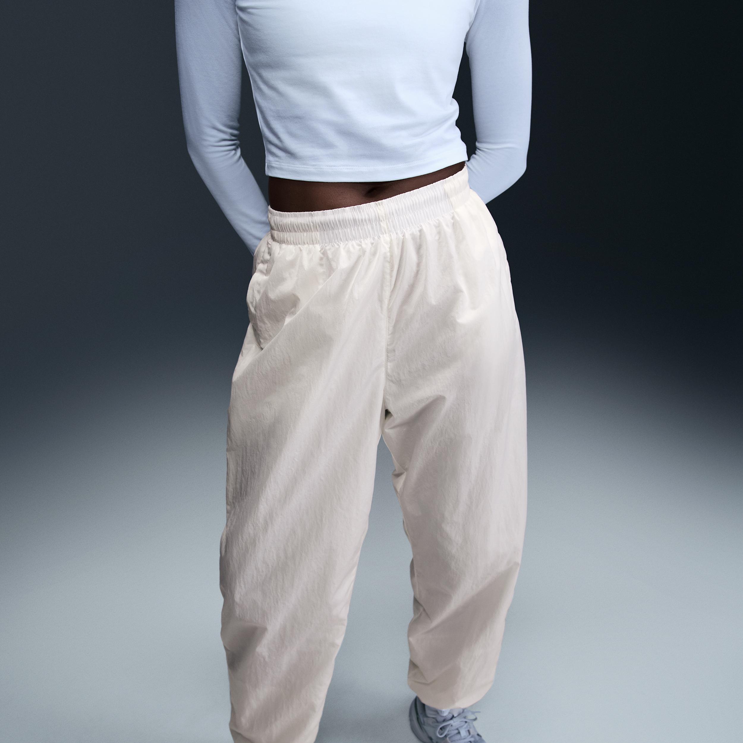 Nike Sportswear Essential Women's Mid-Rise Oversized Woven Joggers Product Image