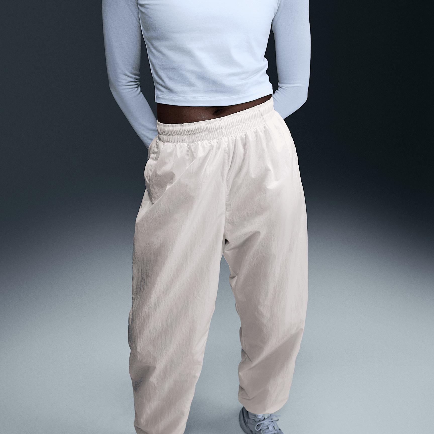 Nike Sportswear Essential Women's Mid-Rise Oversized Woven Joggers Product Image