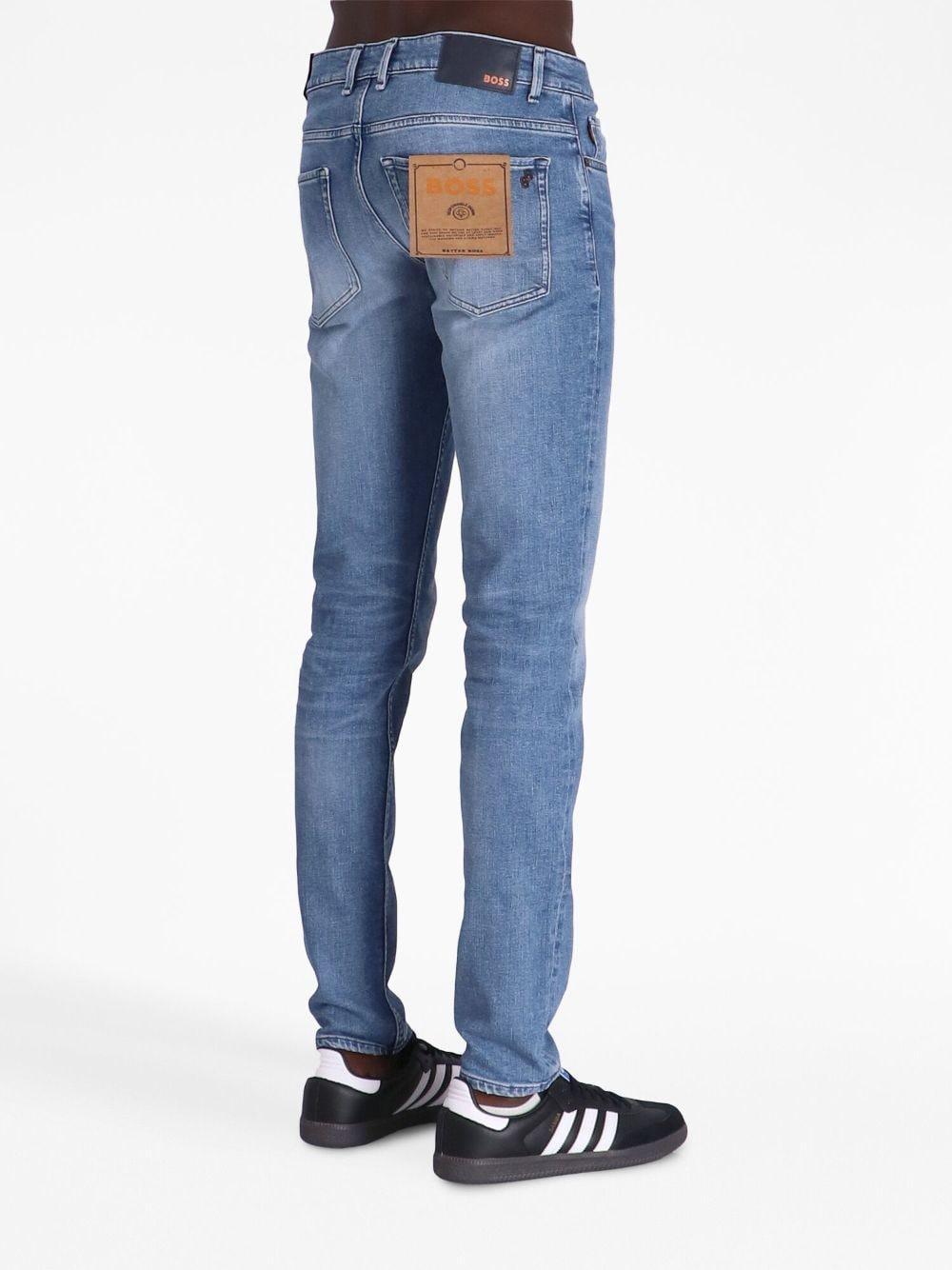 Logo-patch Slim-cut Jeans In Blue Product Image