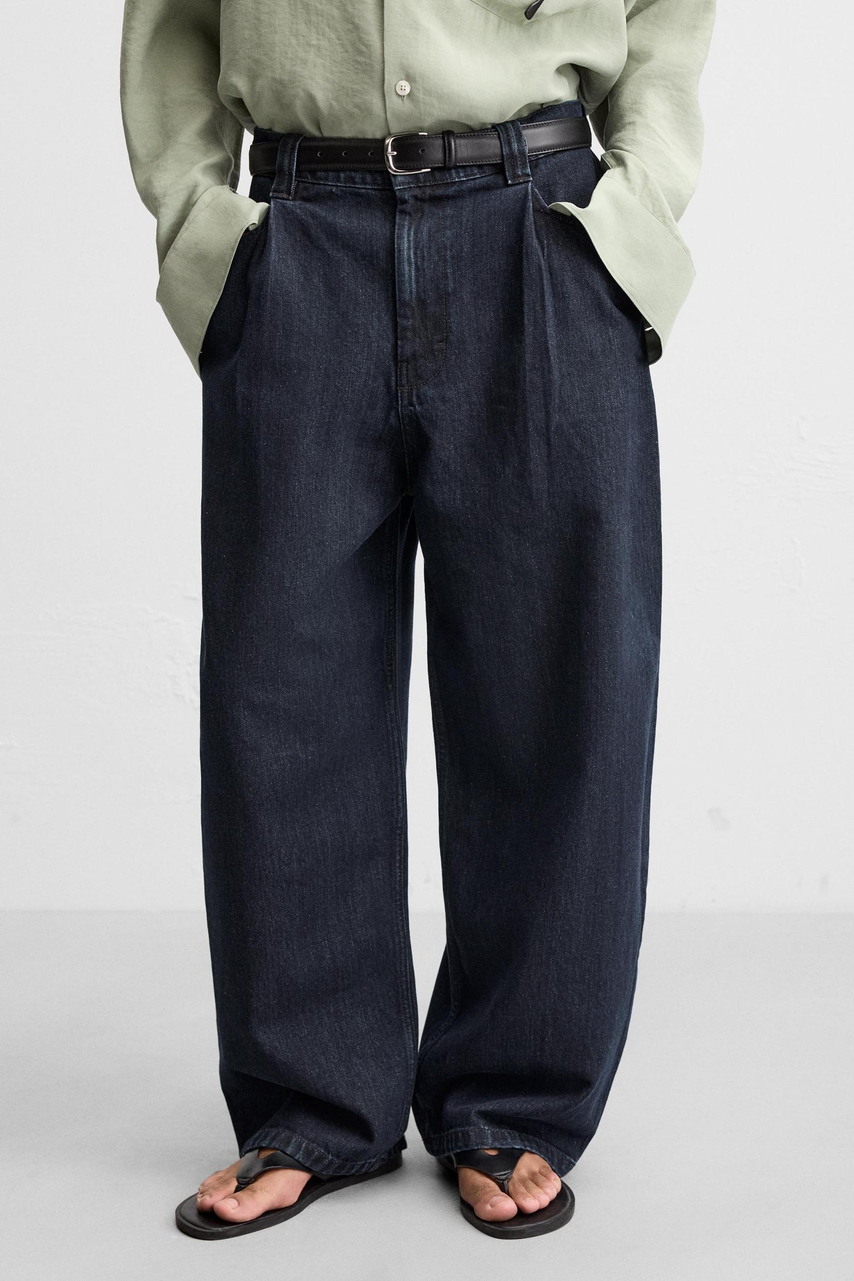 PLEATED WIDE LEG JEANS Product Image