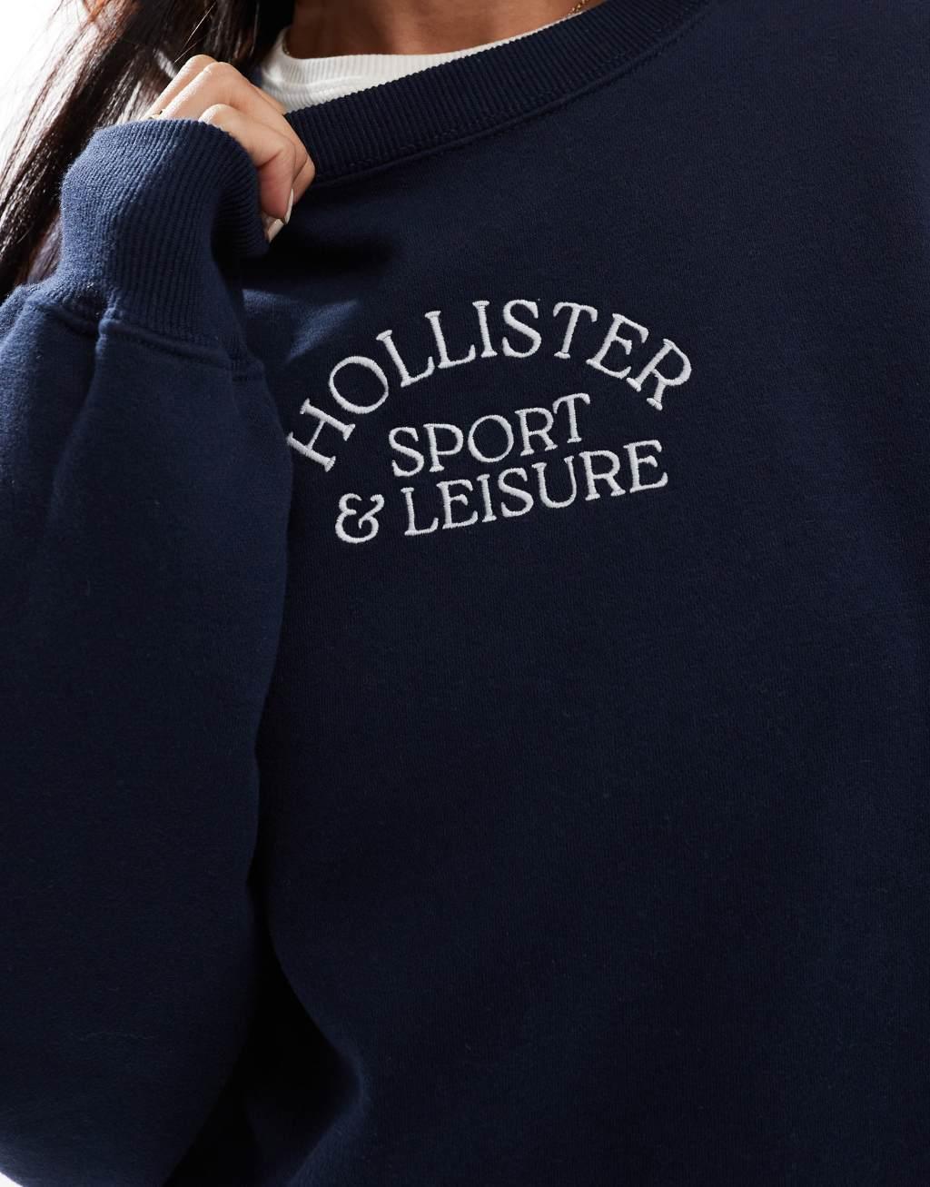 Hollister script logo sweatshirt in navy Product Image