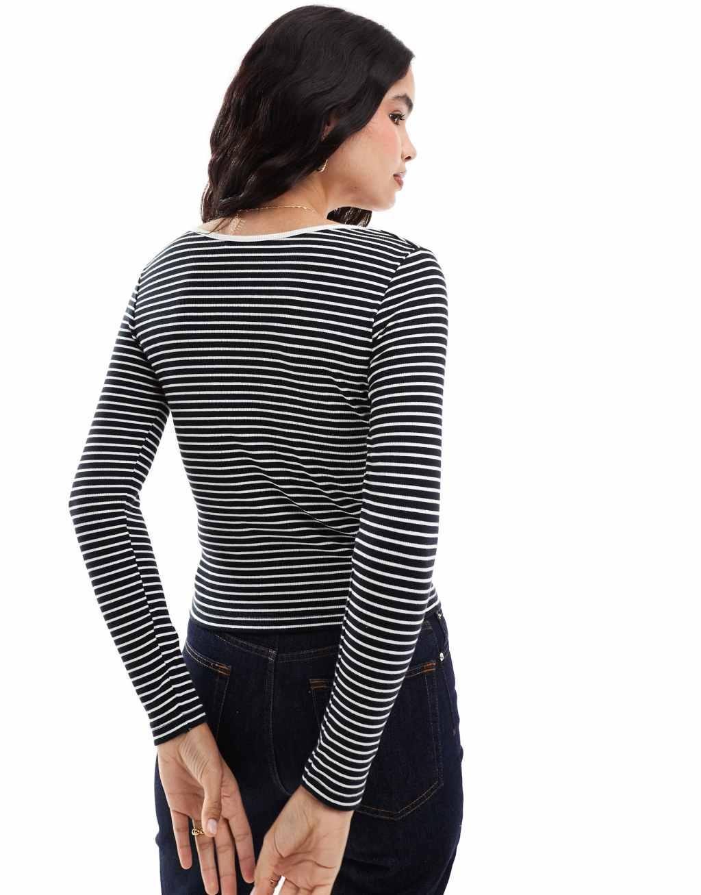 Vero Moda reversible long sleeve t-shirt in black and white stripe Product Image