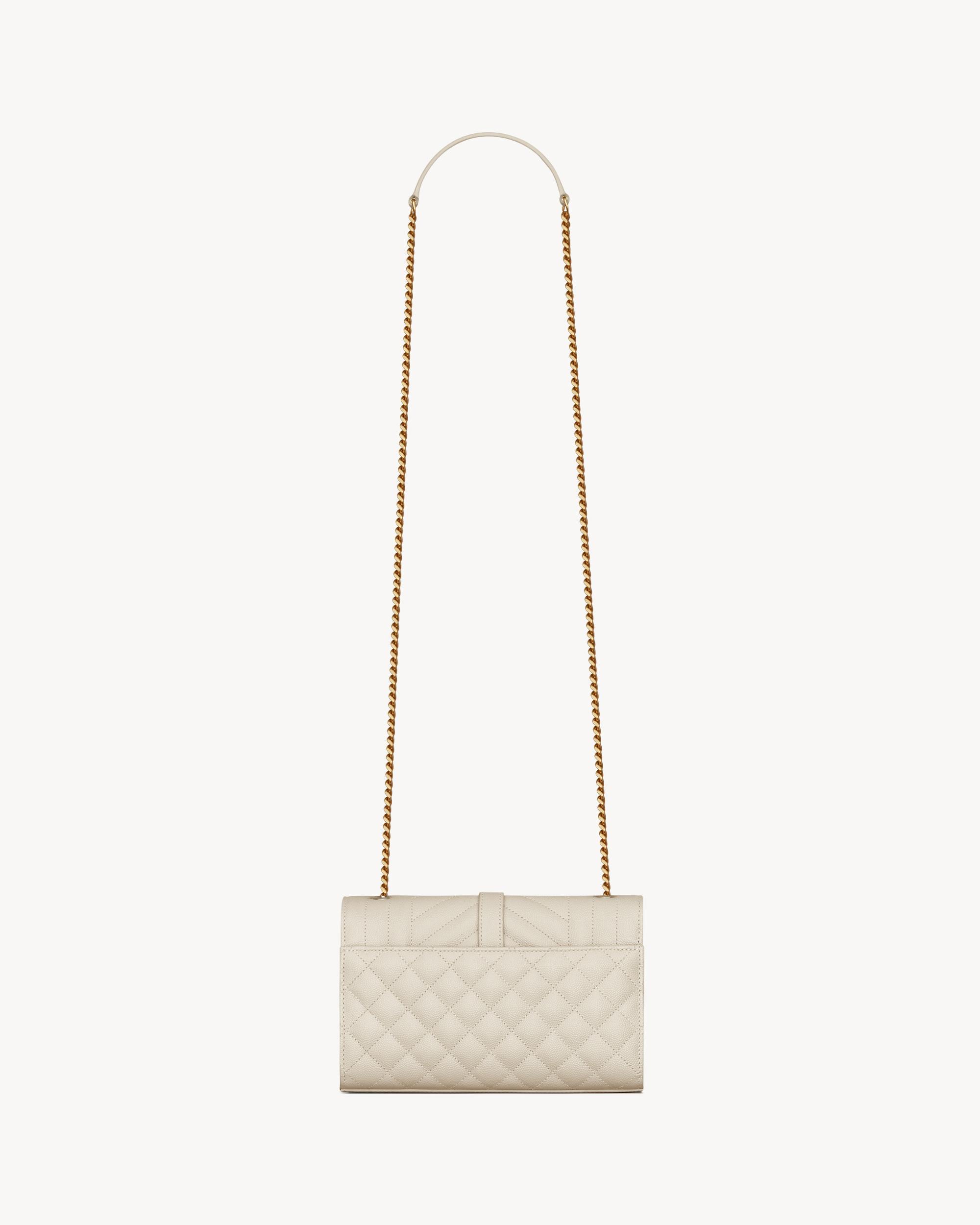 UPTOWN CHAIN WALLET IN GRAIN DE POUDRE EMBOSSED LEATHER Product Image
