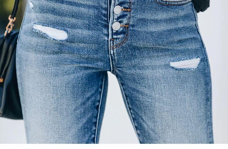 Mid Rise Button Fly Distressed Washed Skinny Jeans Product Image