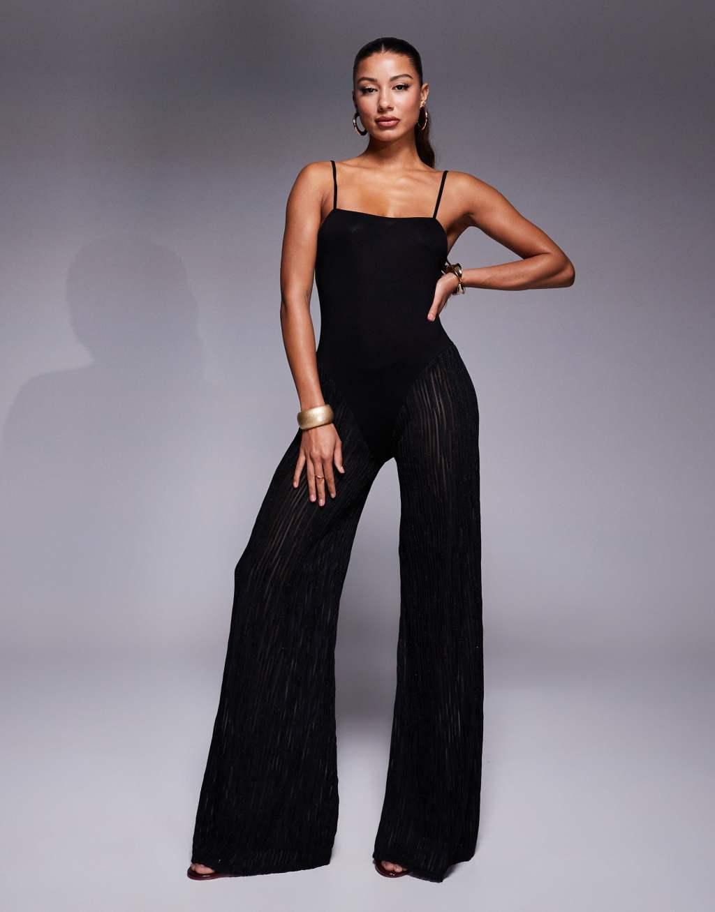 ASOS DESIGN 2 in 1 oversized t-shirt jumpsuit with metallic plisse pants in black Product Image