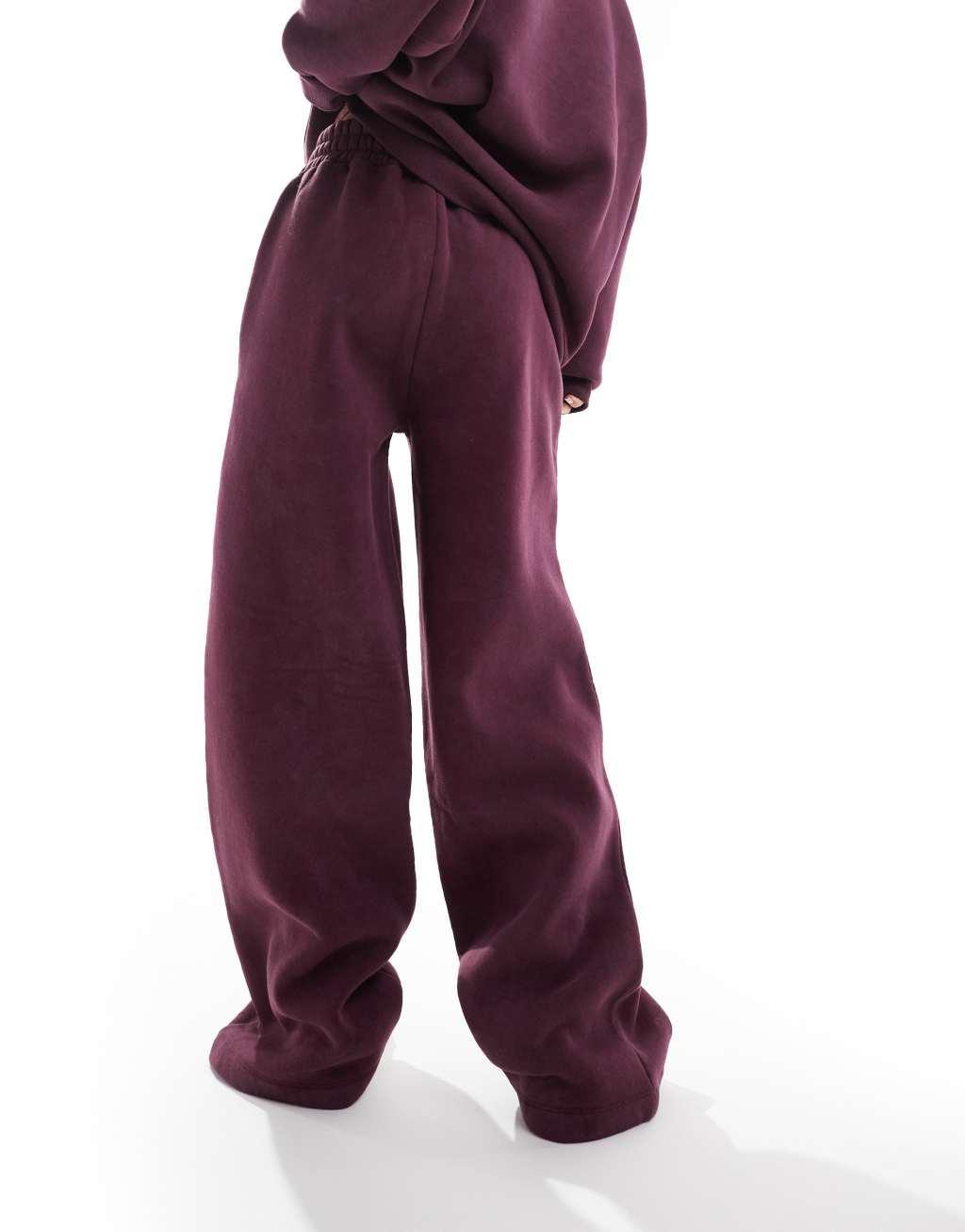 ASOS DESIGN cocoon leg sweatpants in acid wash burgundy - part of a set Product Image