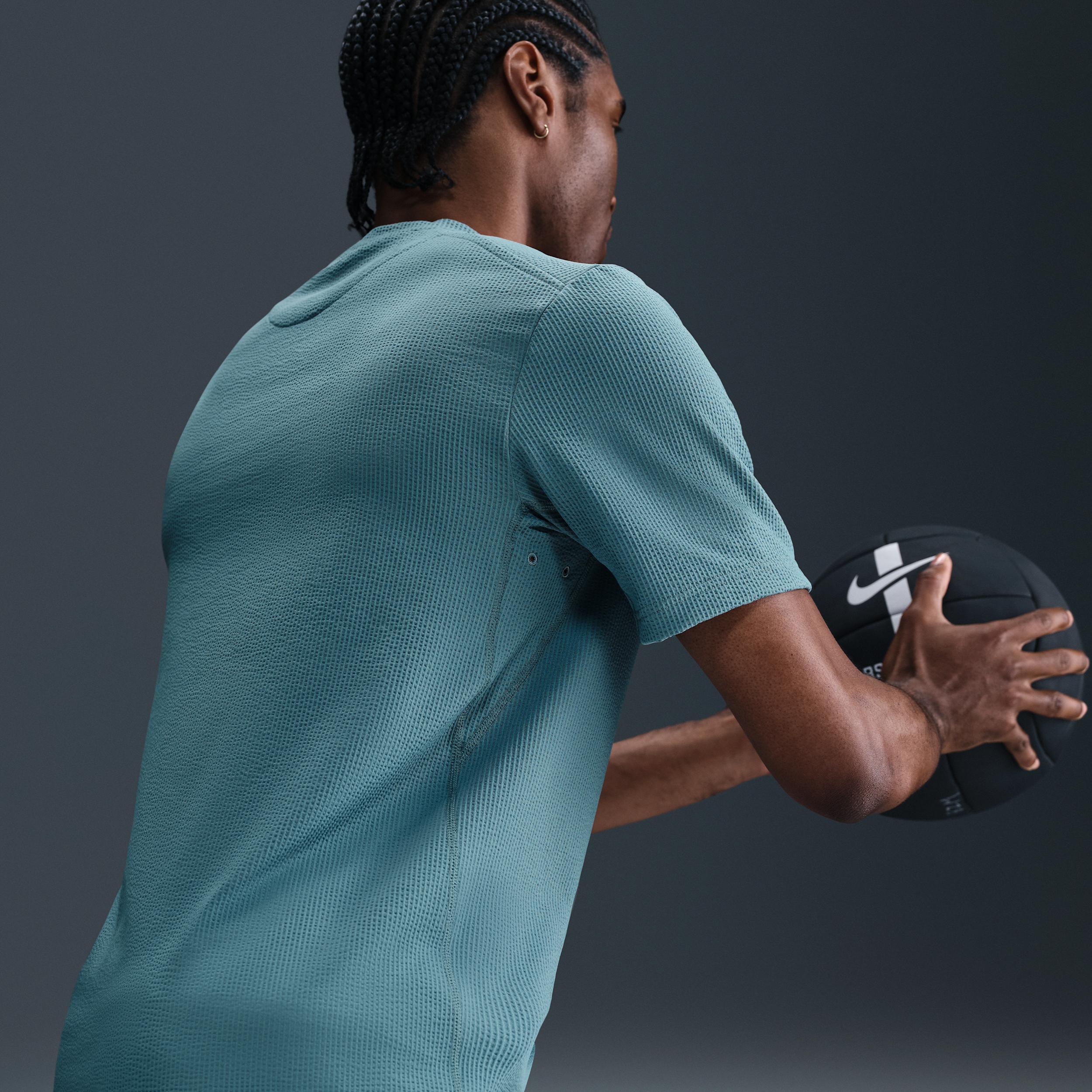 Nike Primary Men's Dri-FIT Short-Sleeve Versatile Top Product Image