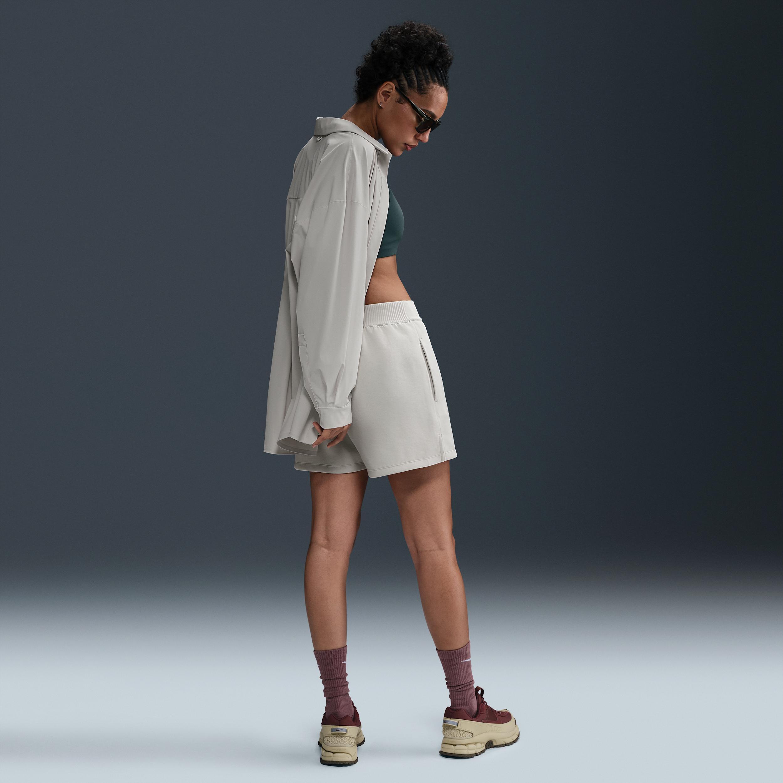 Nike Women's 24.7 ImpossiblySoft Dri-FIT Mid-Rise Loose 4" Shorts Product Image