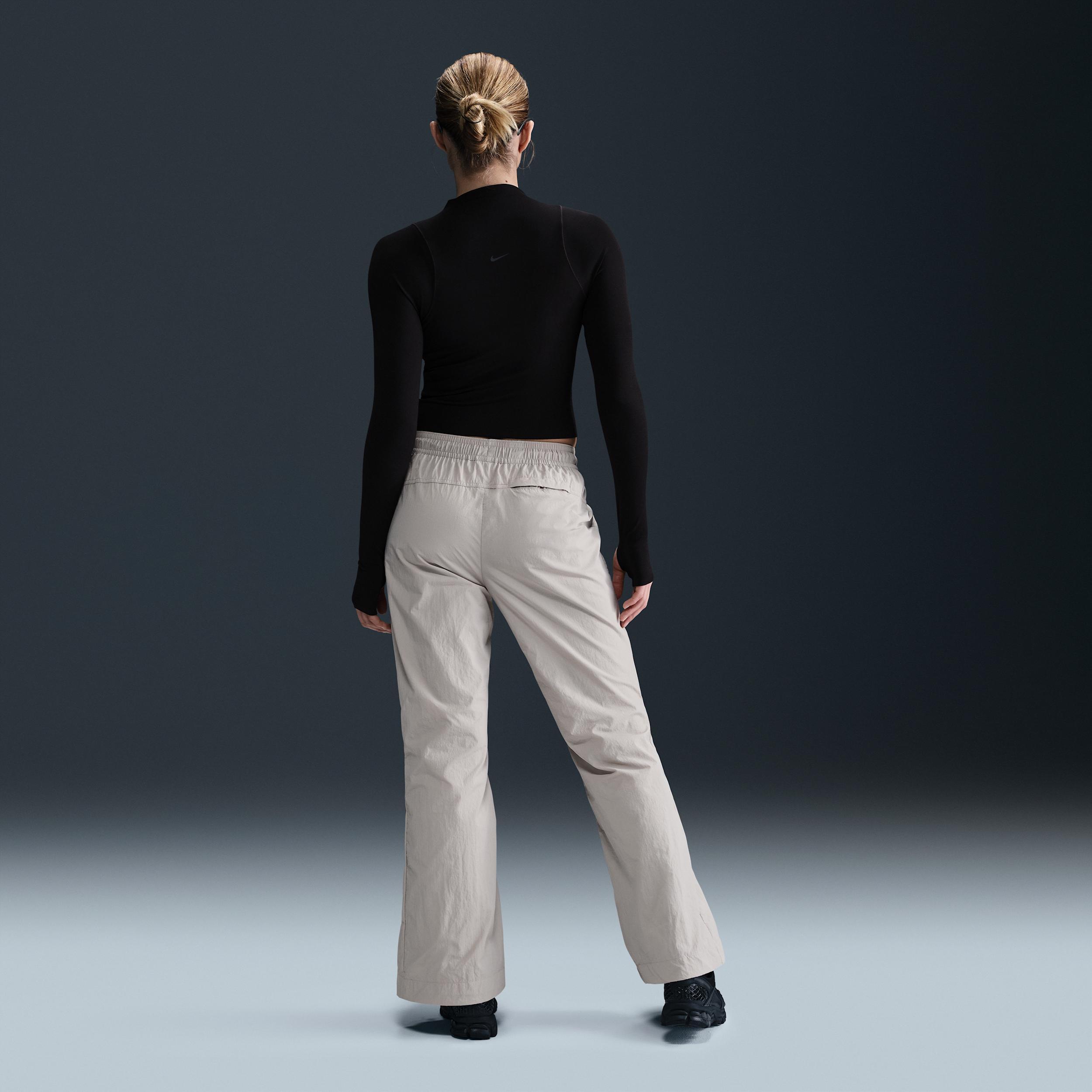 Nike Sportswear Collection Women's Mid-Rise Repel Zip Pants Product Image