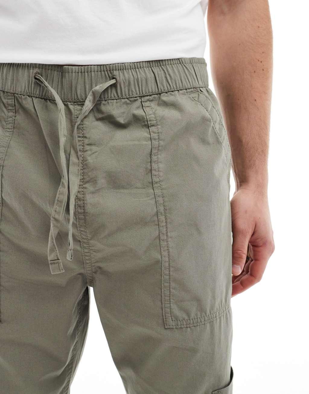 ASOS DESIGN pull on cargo sweatpants in brown Product Image