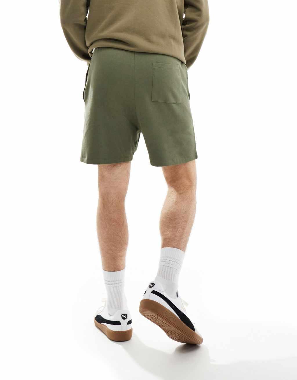 ASOS DESIGN slim fit shorts in olive Product Image