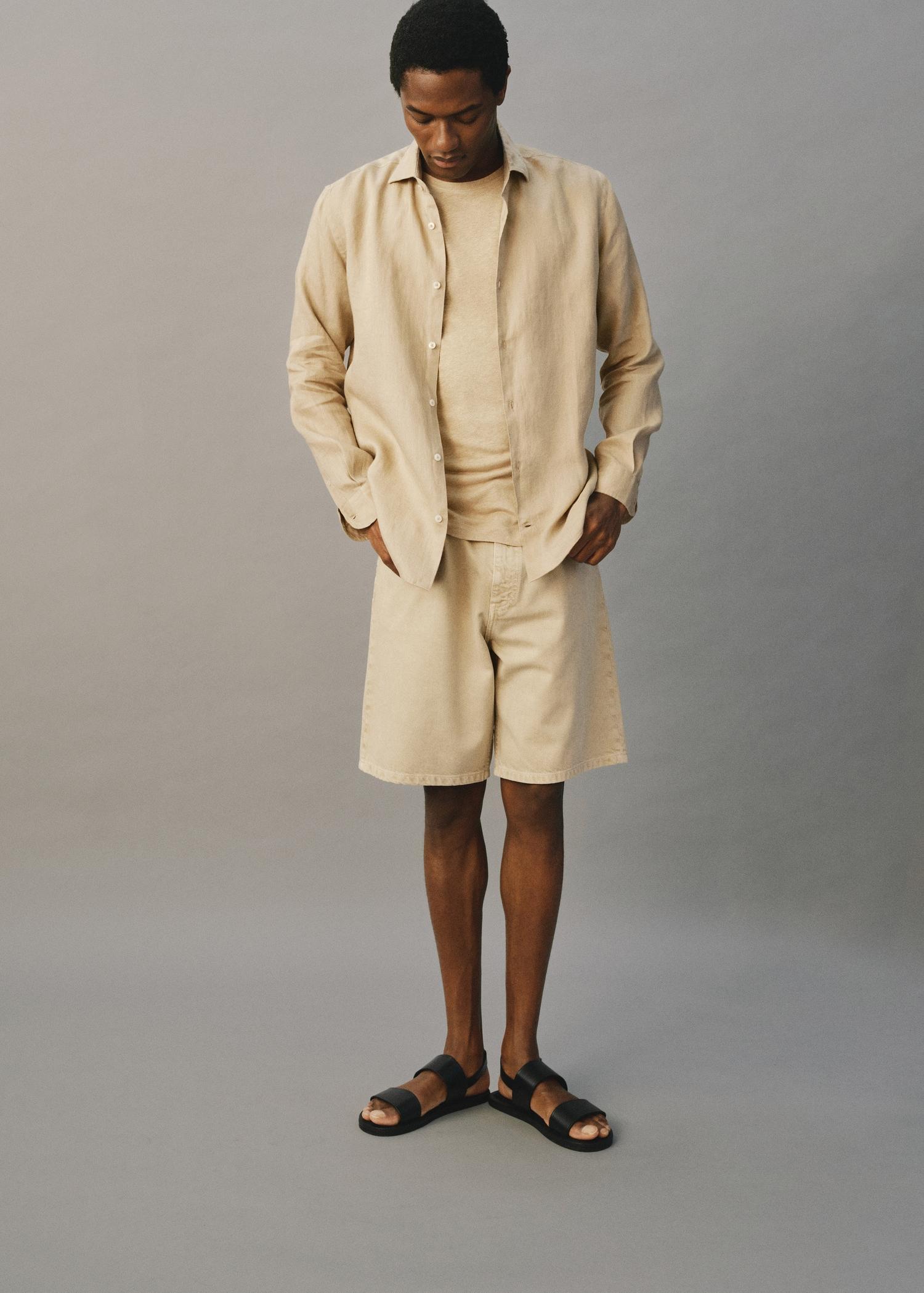 Denim relaxed-fit bermuda shorts - Men | MANGO USA Product Image