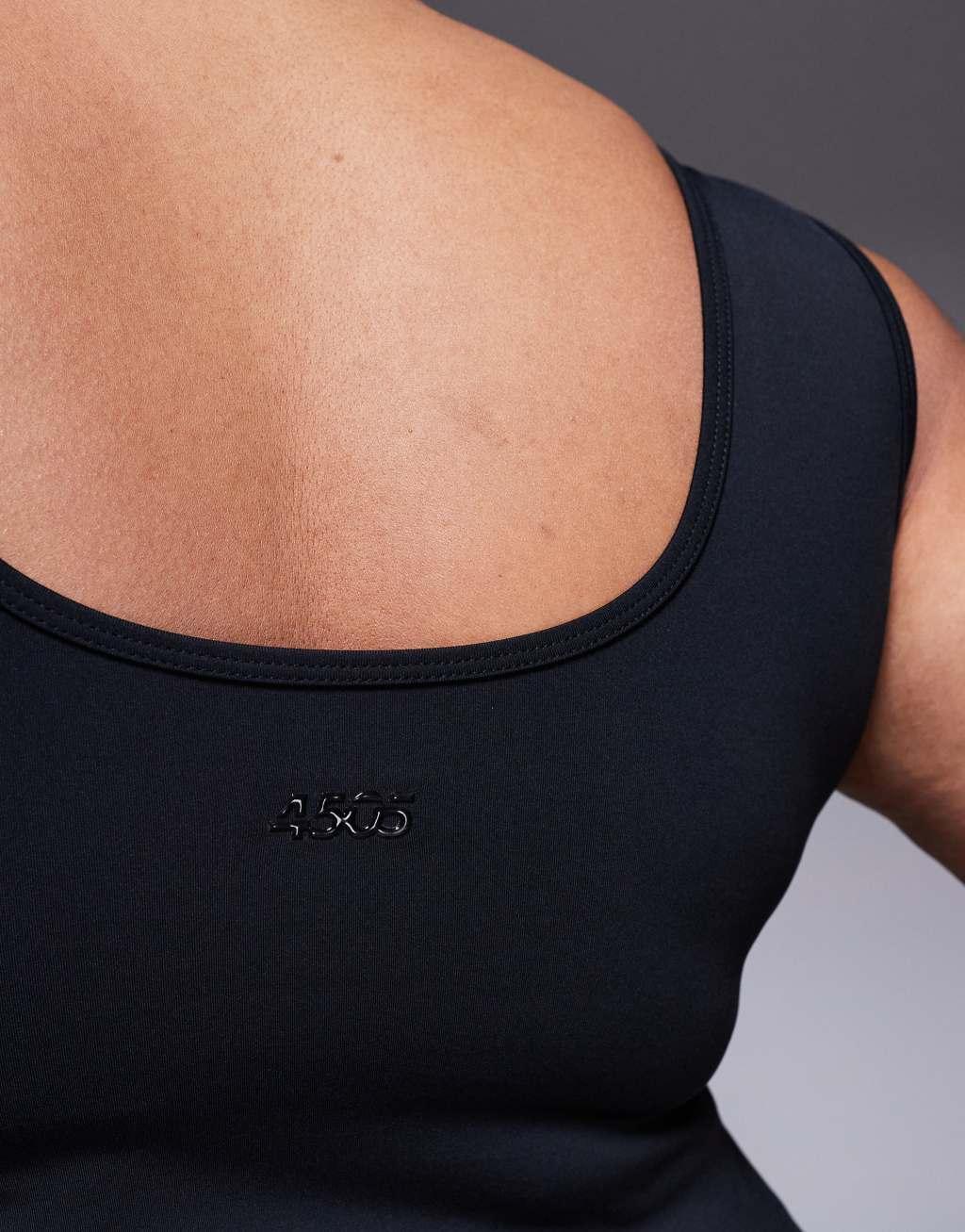4505 Curve Icon scoop neck slightly cropped training tank top in black  Product Image