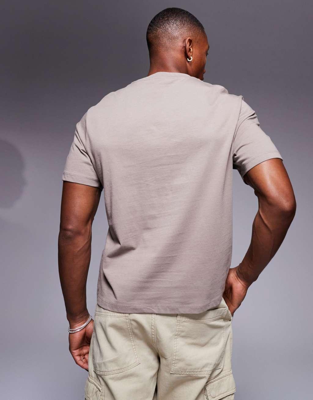ASOS DESIGN boxy t-shirt in brown with street chest print Product Image