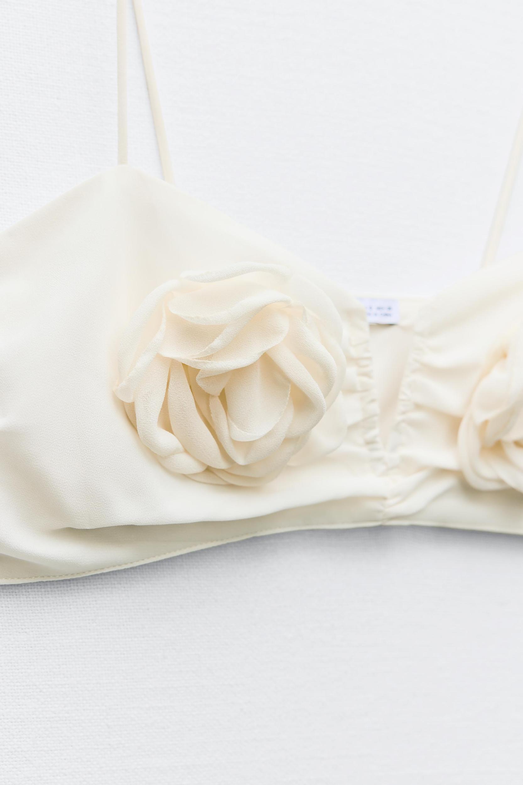 DRAPED TOP WITH TEXTURED FLOWERS Product Image