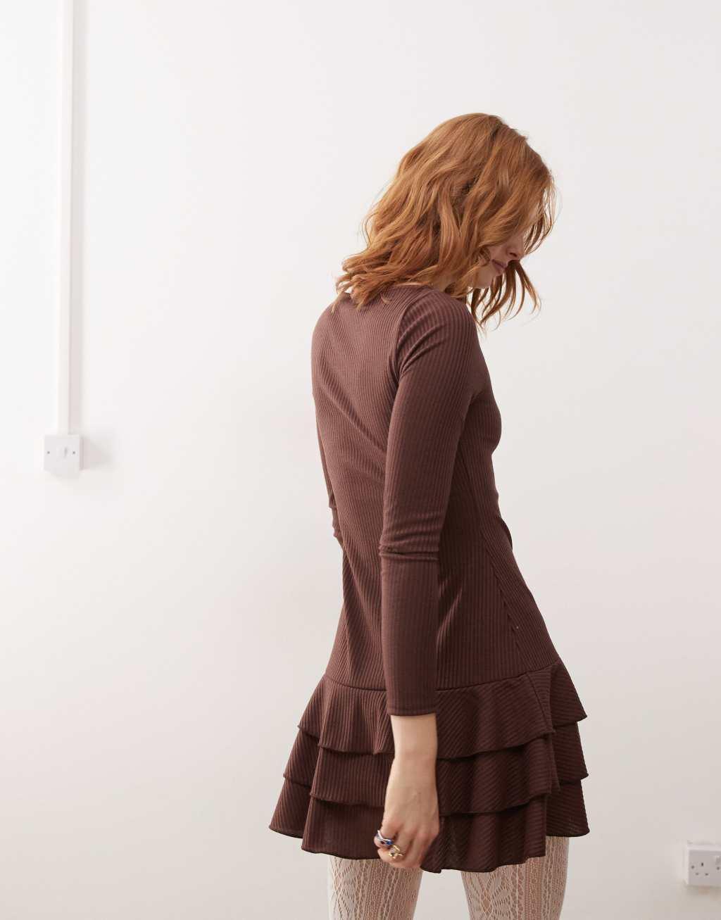 Reclaimed Vintage long sleeve ruffle drop waist mini dress in brown Product Image