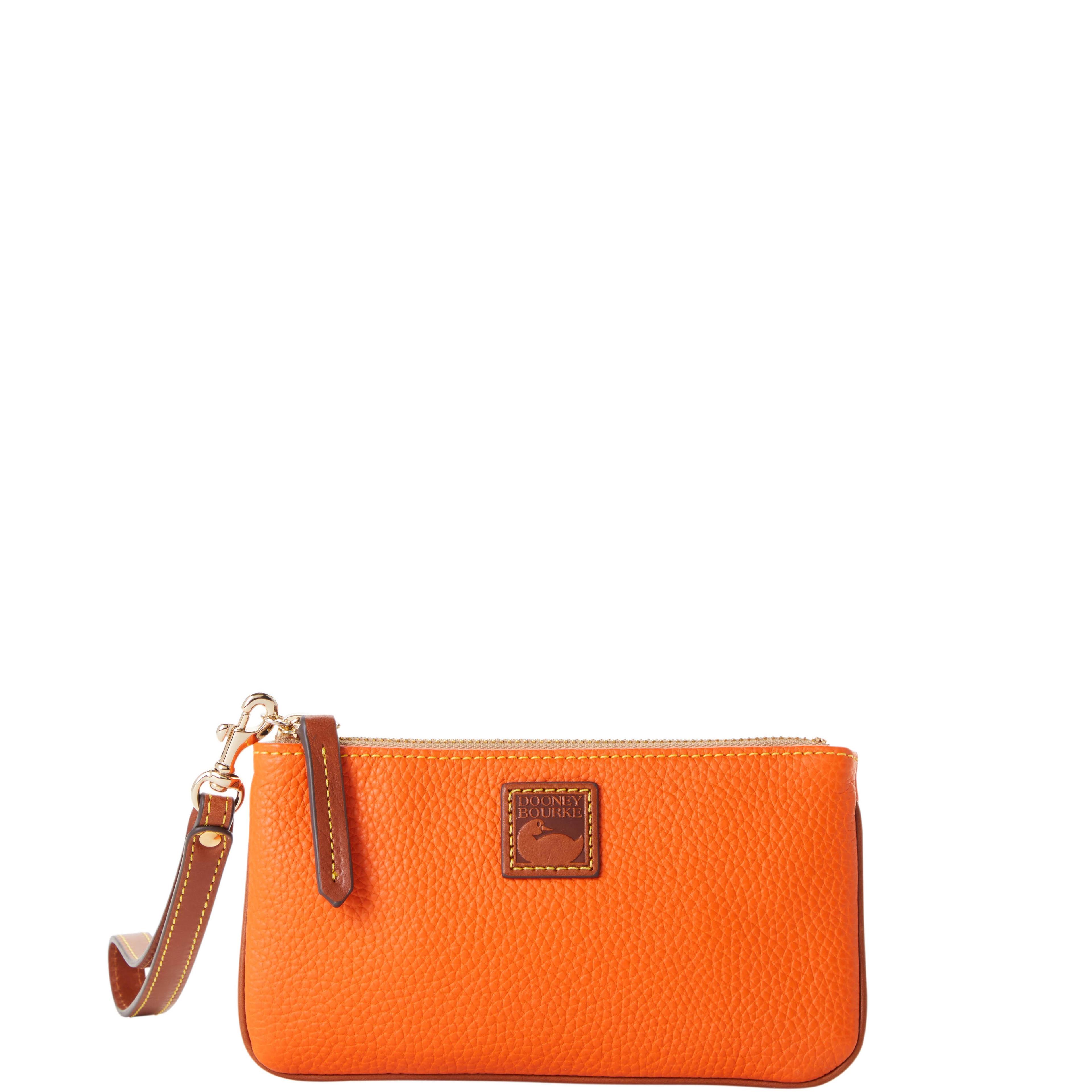 Dooney & Bourke Womens Pebble Grain Medium Leather Wristlet in Wine Product Image